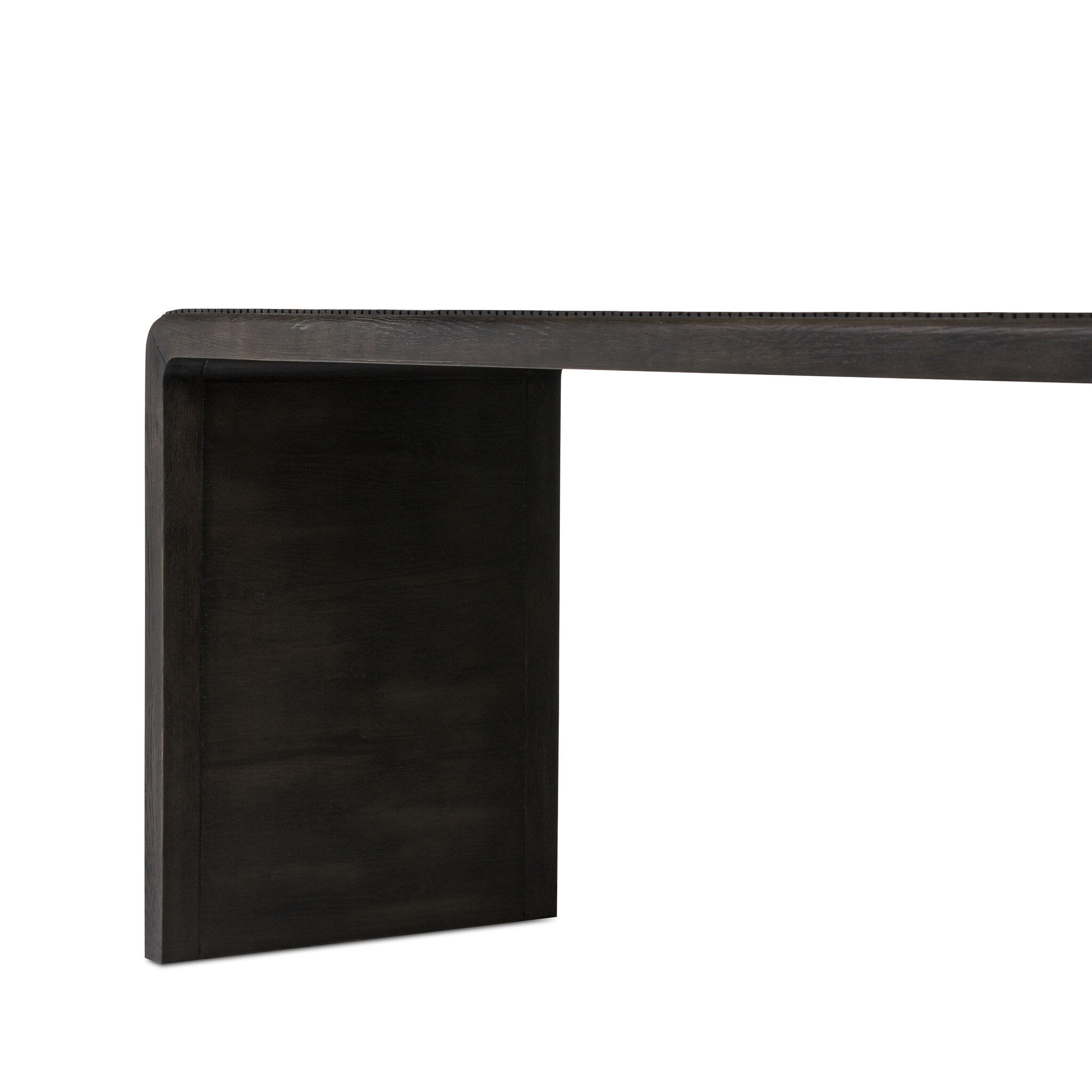 Smoked black oak console table with reeding and rounded edges on a white background.