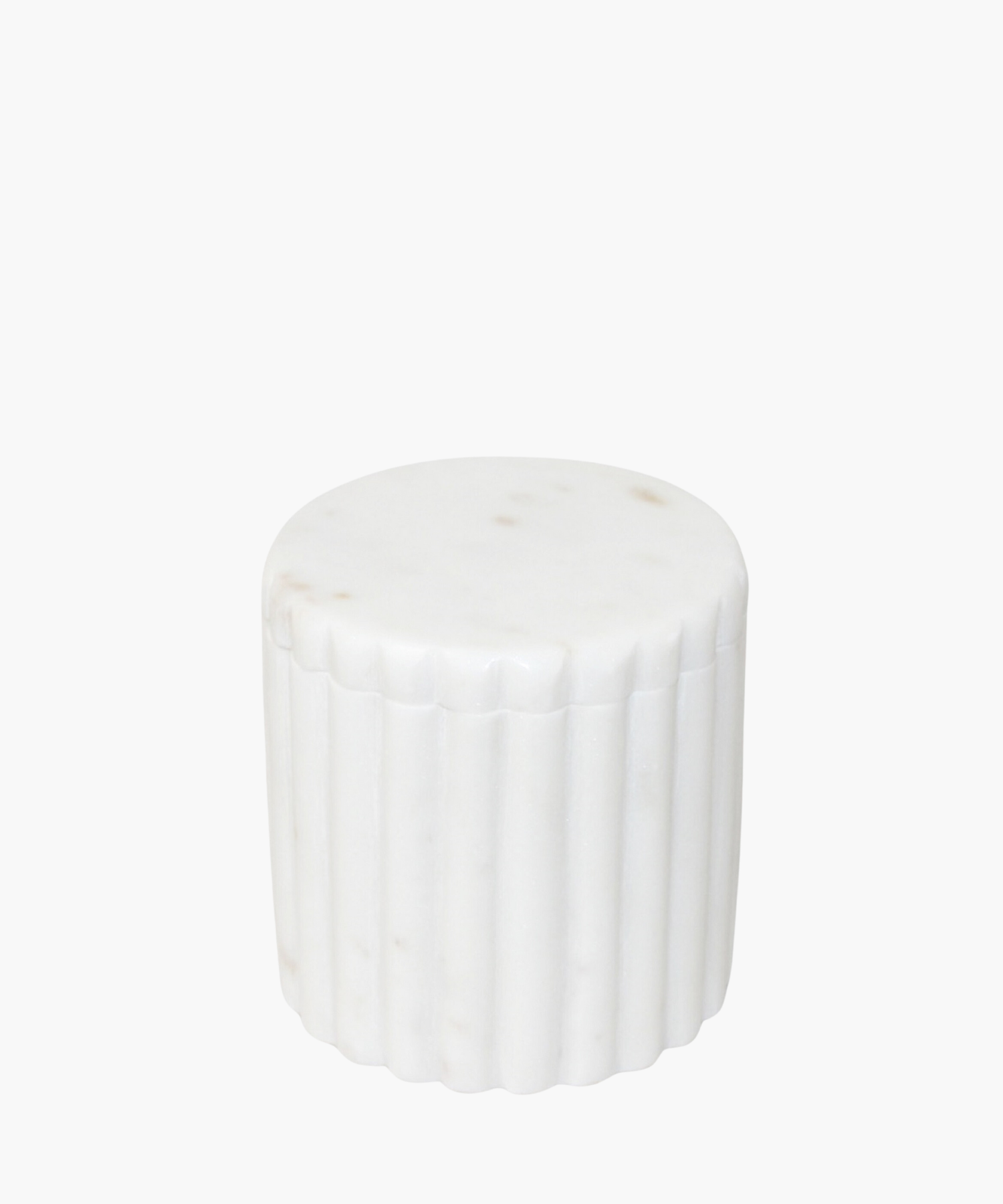 A white cylindrical canister made of smooth marble, with vertical grooves along its sides. The design is sleek and minimalist, conveying a modern aesthetic.
