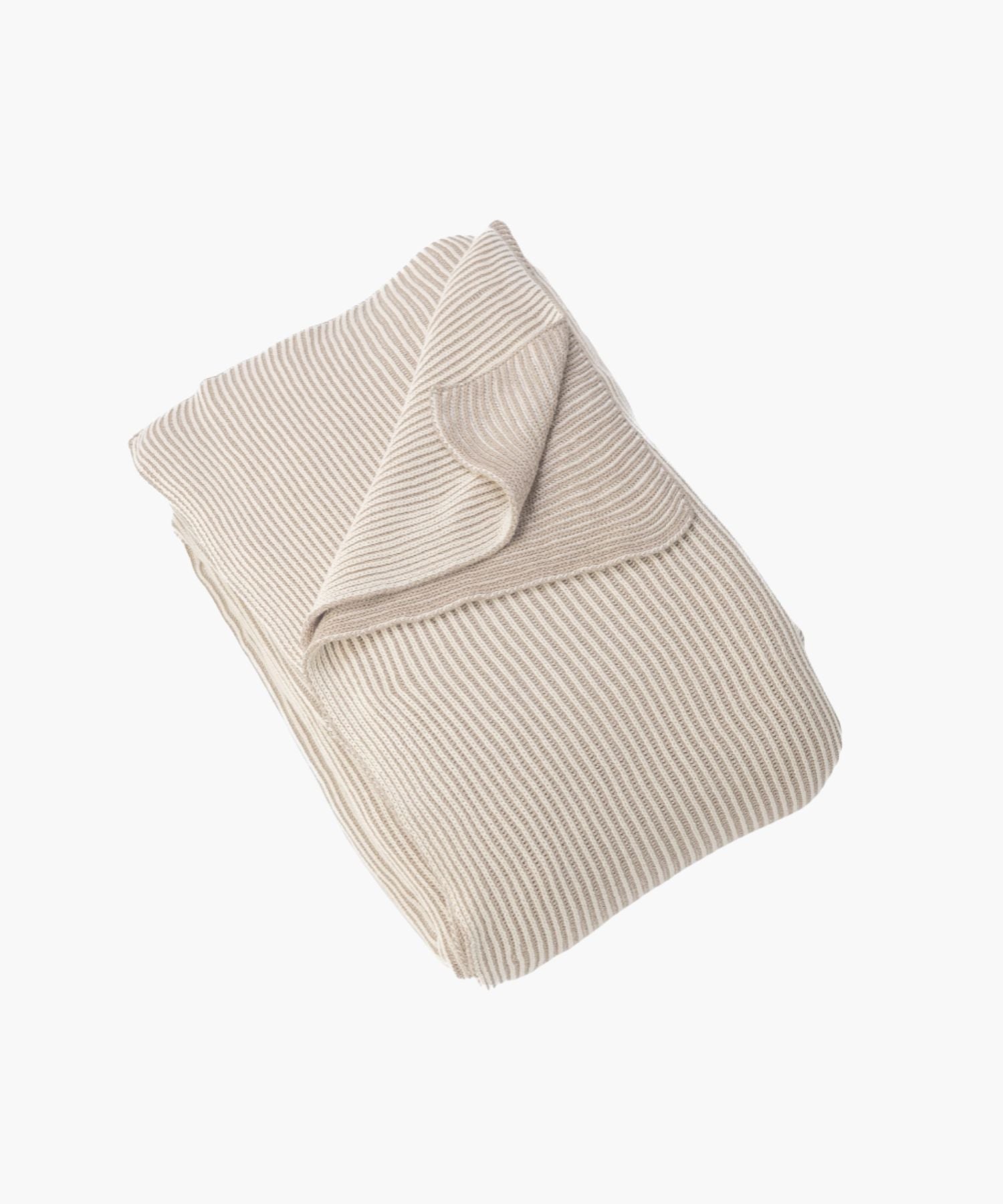 Folded view of the Amory Coverlet in cream-toned ribbed knit, showcasing its soft drape and plush texture.