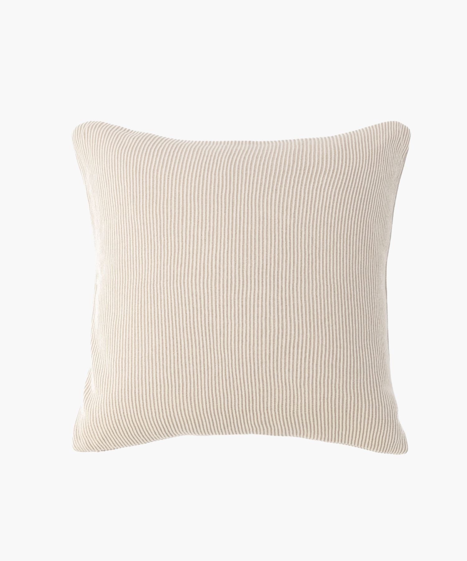 Full front view of the Amory Sham in ribbed cream knit, highlighting its square shape and textured softness.
