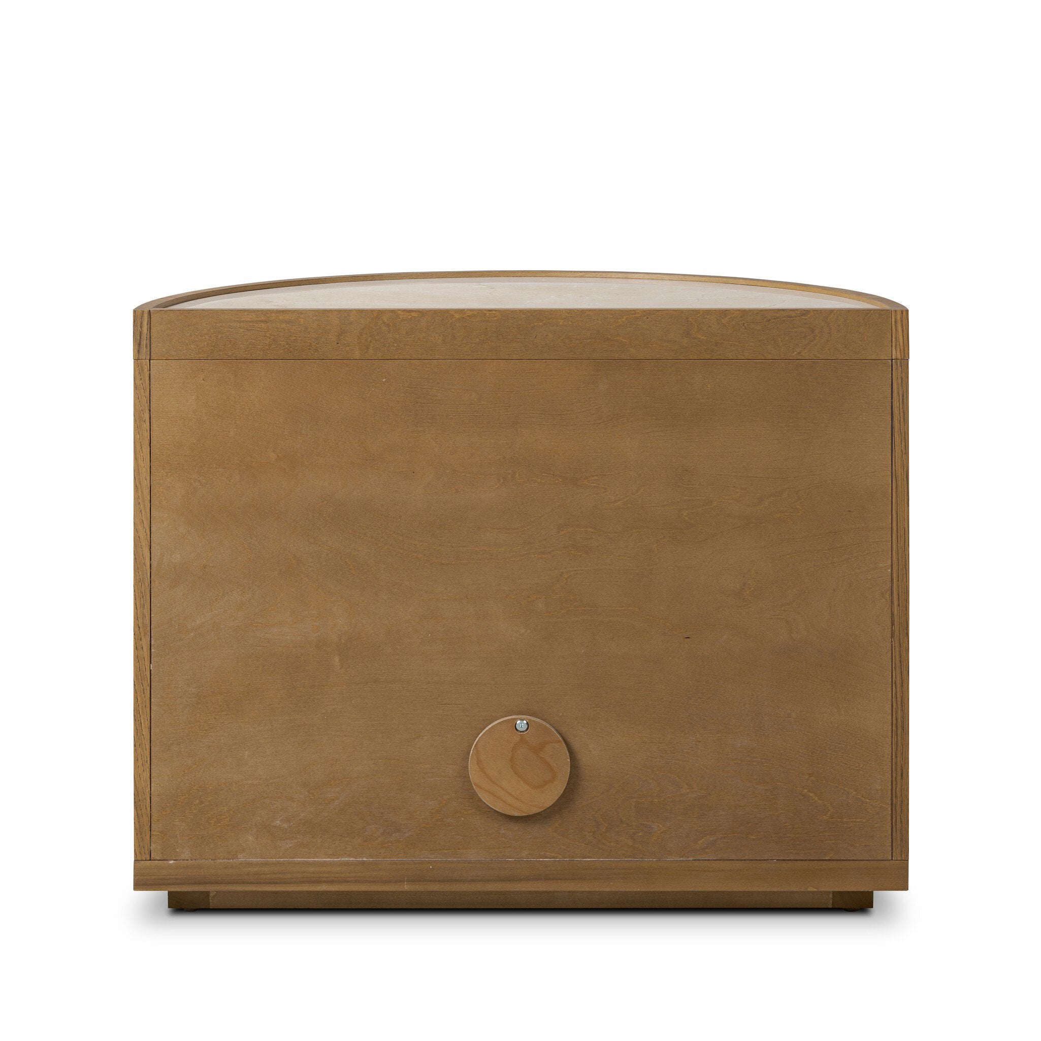 The back of a crescent style night stand with doors and cream marble top.