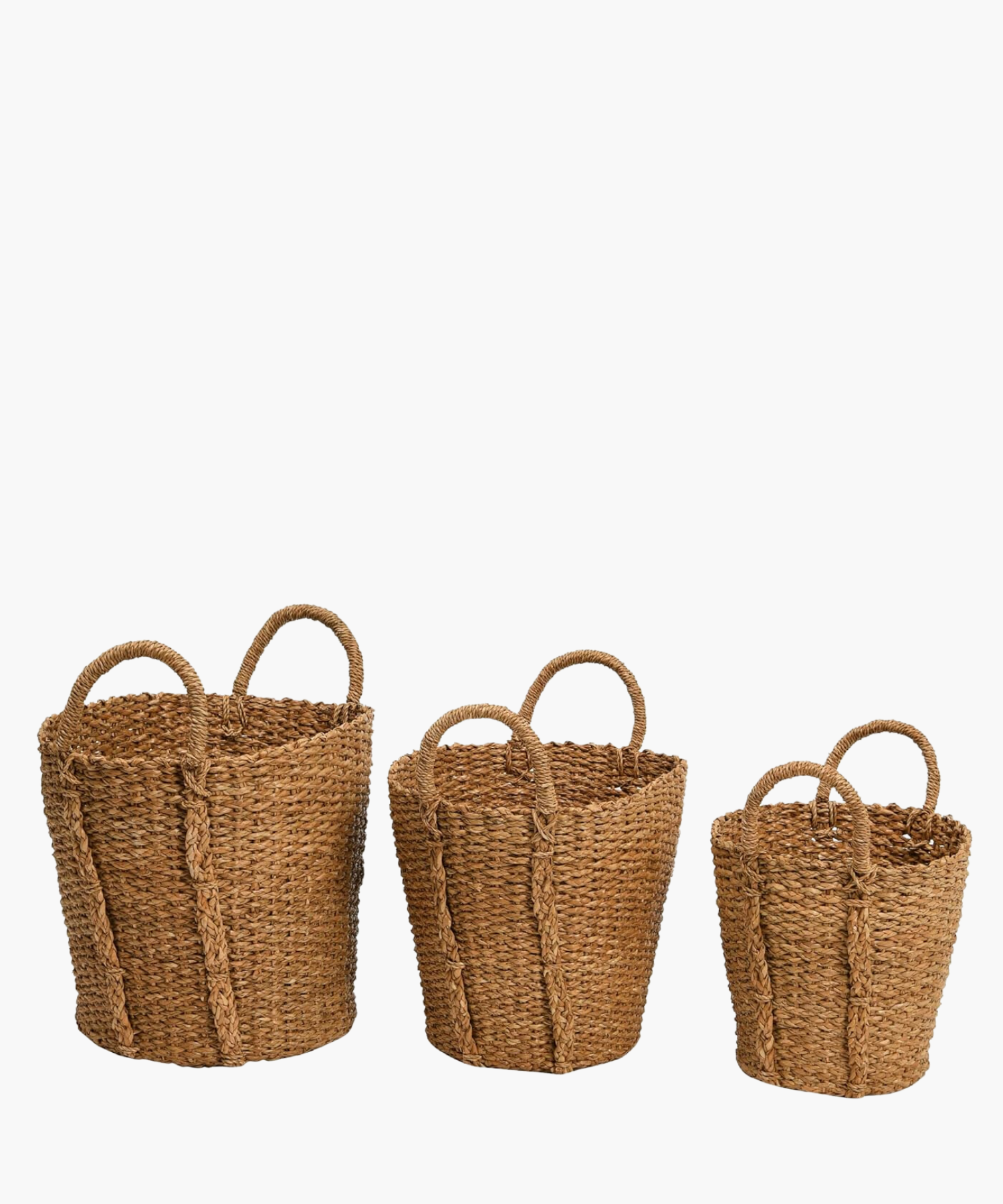 Three hand-woven baskets in various sizes each with two sturdy looped handles. The basket's braided texture conveys a rustic and natural feel, perfect for storage or decoration.