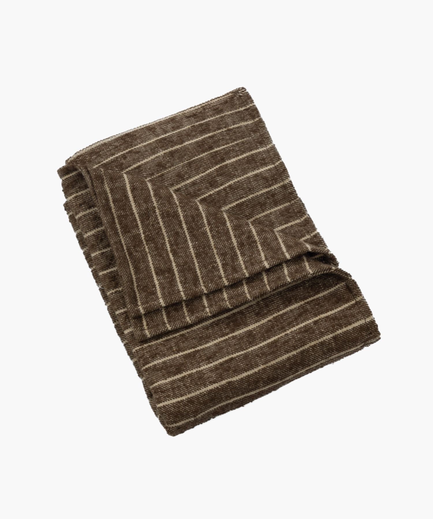 Angled fold of the Bruno Duvet Cover in brown pinstripe, emphasizing its tight weave and soft boucle surface.