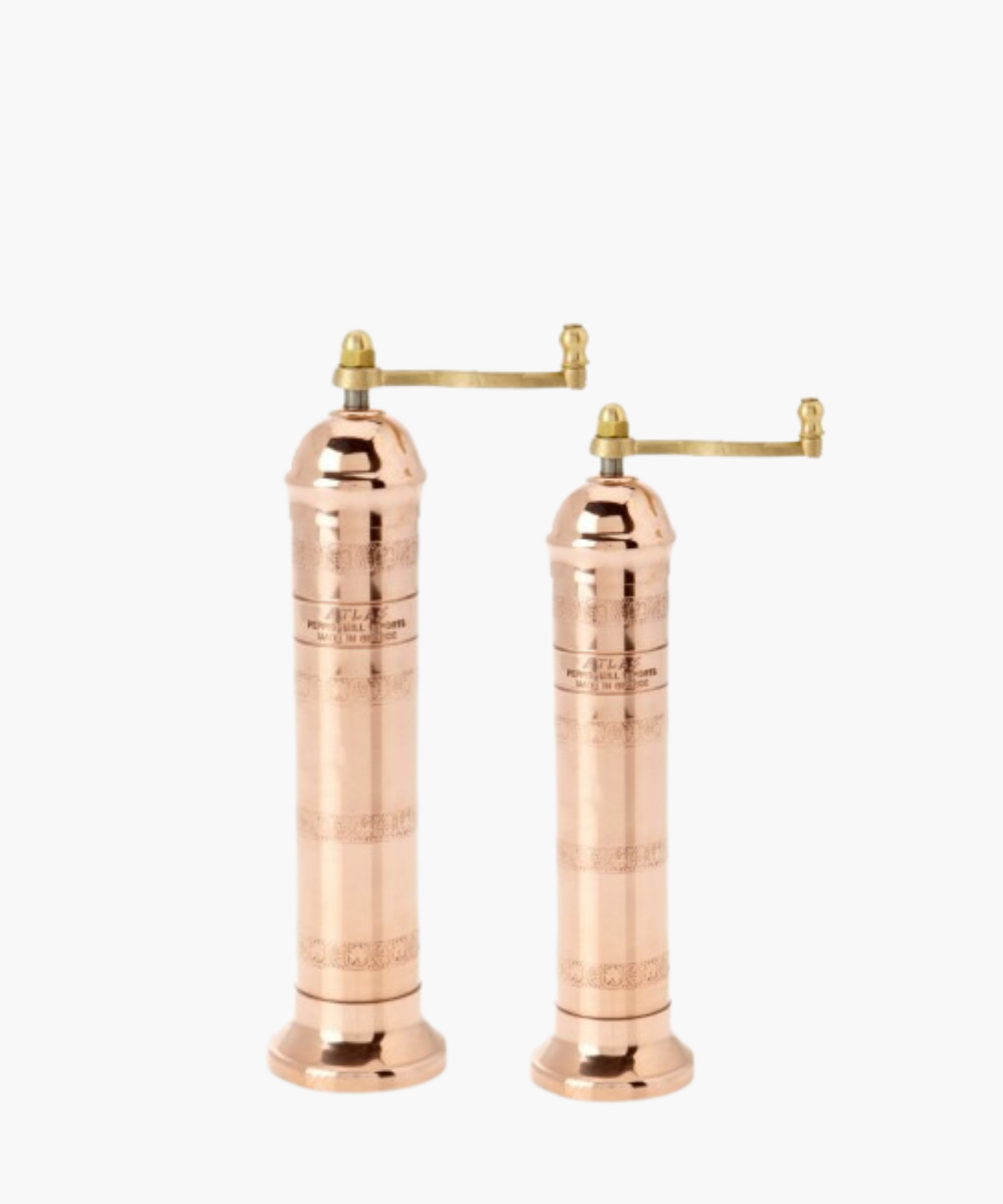 Copper manual pepper mill and copper salt mill with a brass handle, featuring an ornate design. The elegant, vintage style evokes a sense of classic craftsmanship.