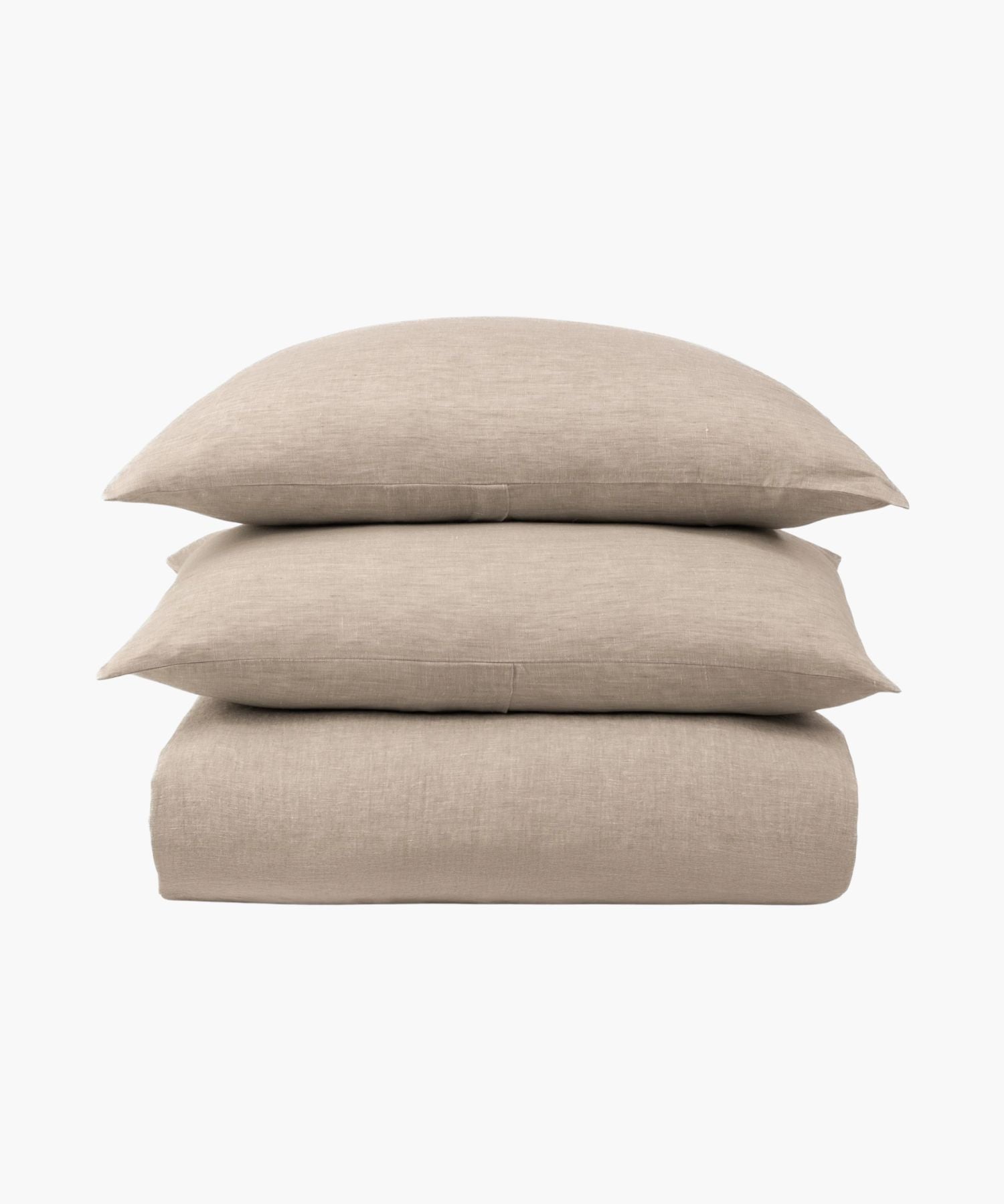 Beige bed sheet set with two pillows on a white background