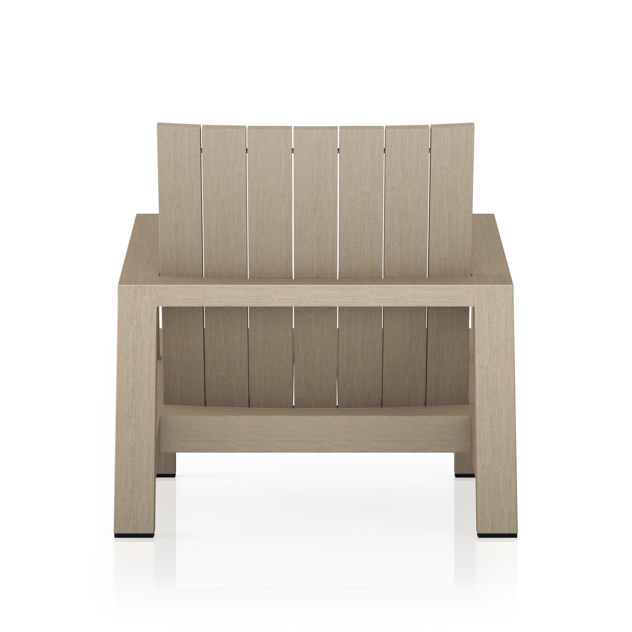 The back of an Adirondack inspired outdoor chair made of teak with a wide angled frame with linear lines.