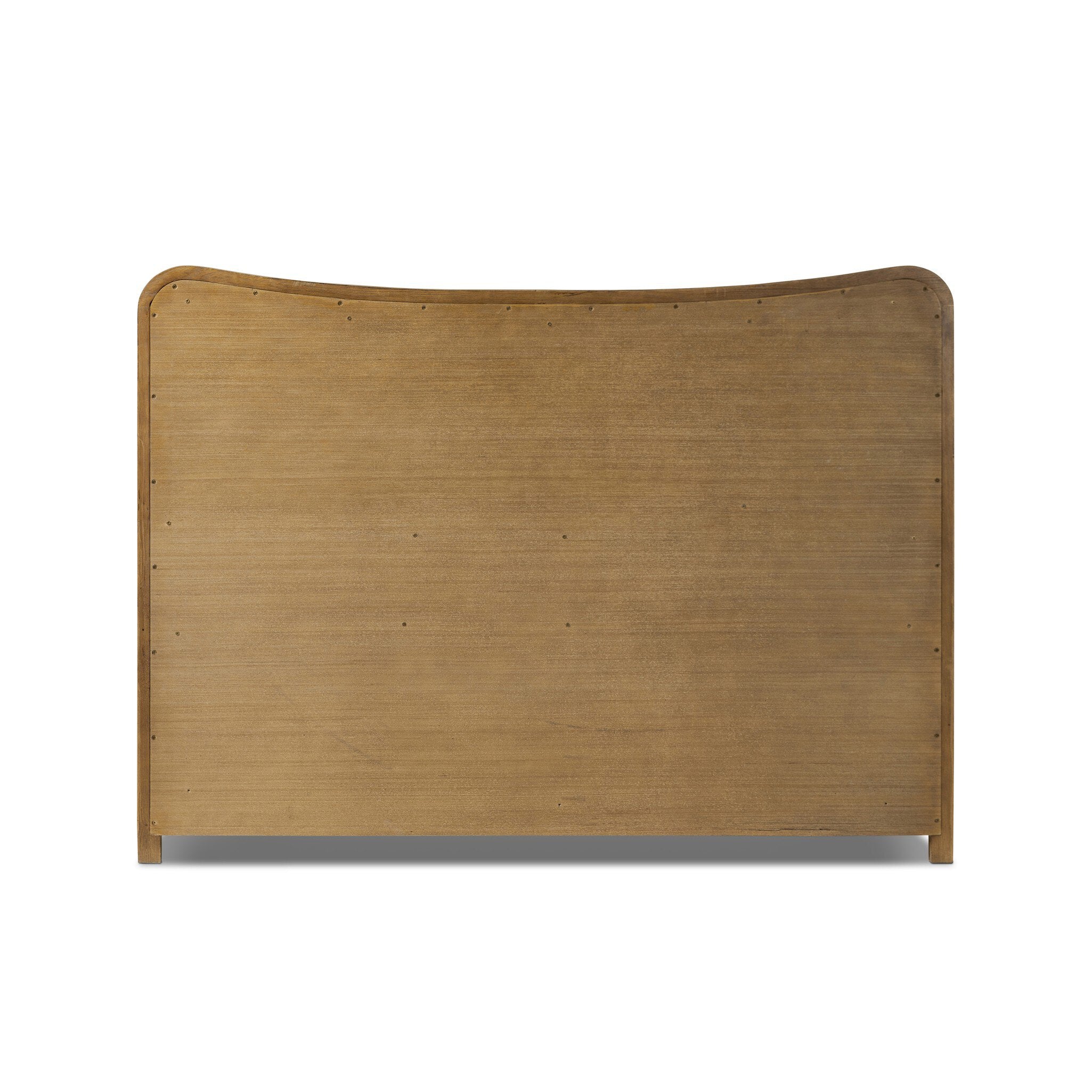 The back of a heritage-inspired oak bed featuring soft curves, linen upholstered headboard, and white bedding on a white background.