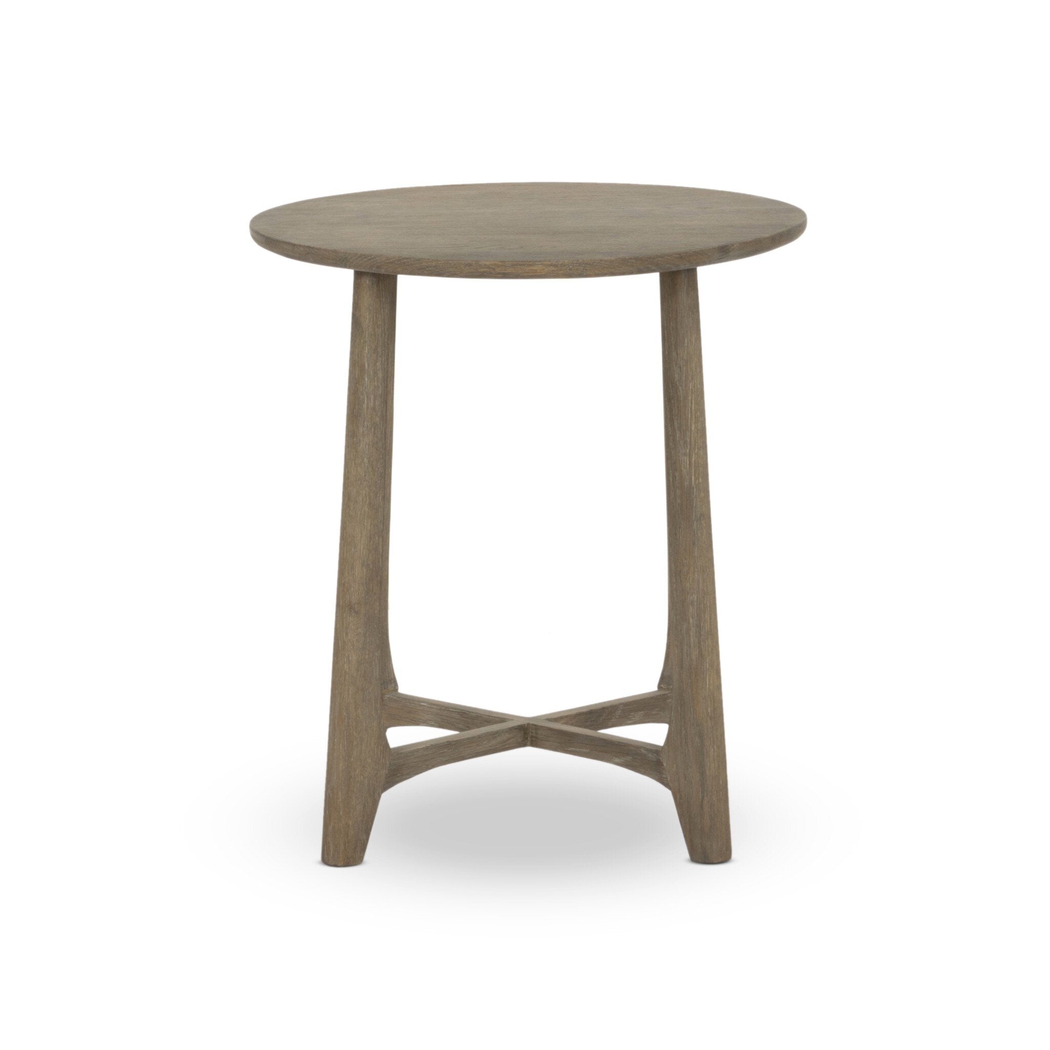 Simple oak round side table on a white background.