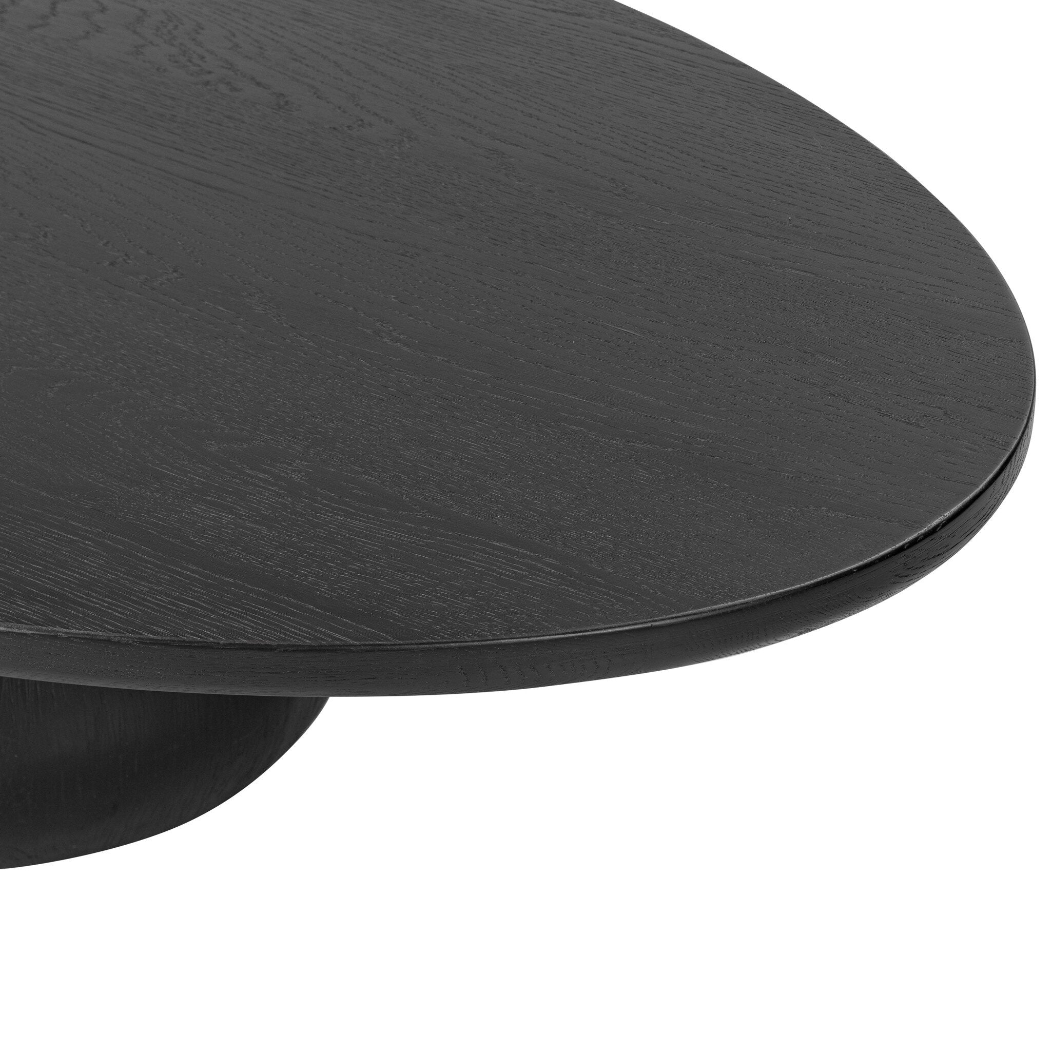 Close up of a black oval shaped coffee table on a white background.