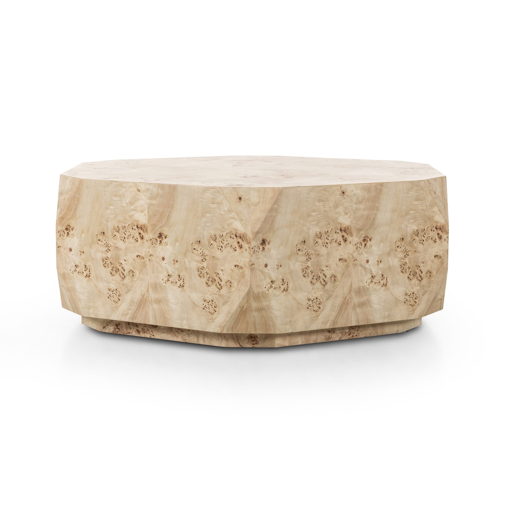 Organic-looking shaped coffee table with a natural finish on a white background.