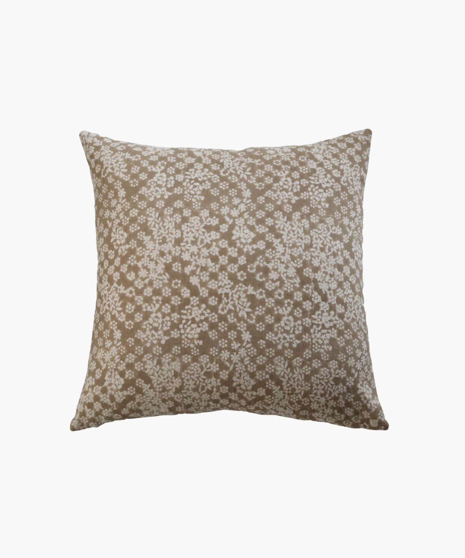Beige floral patterned pillow on a white background.