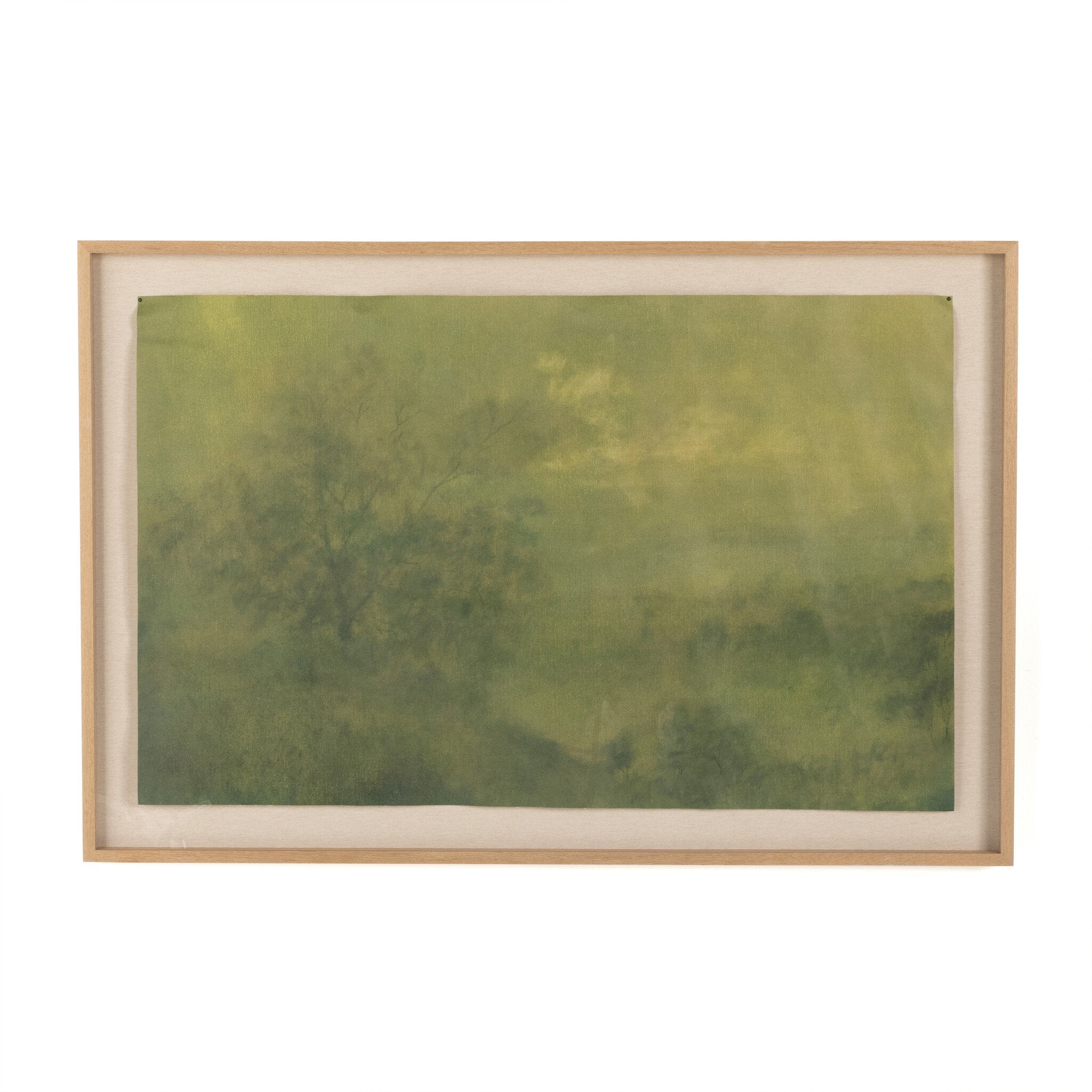 Framed artwork with a green abstract design on a white background.