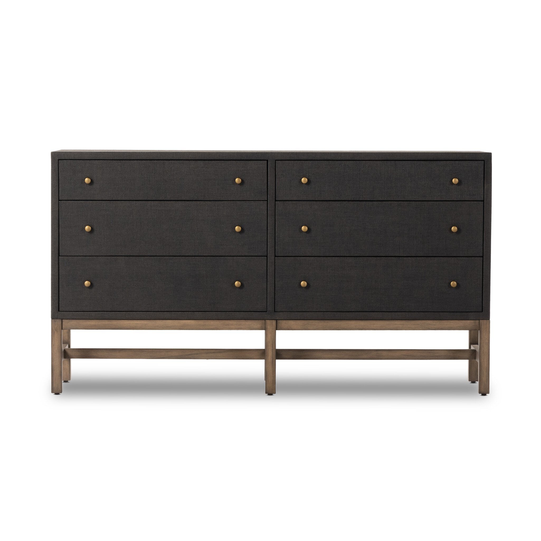 Black dresser with brass knobs with wooden legs on a white background.
