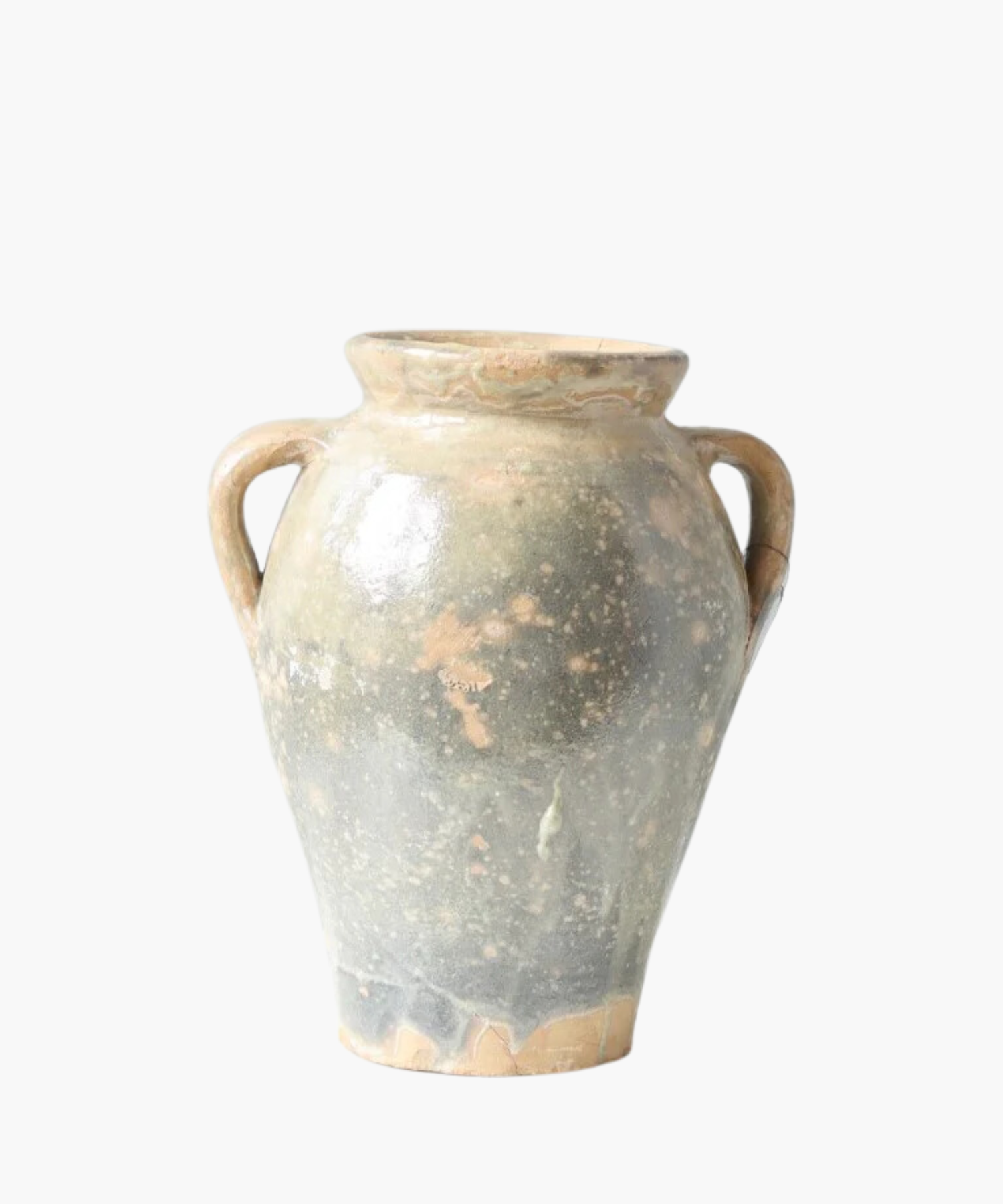 A weathered, ancient clay vase with a speckled blue tone surface and two curved handles, conveying a rustic, historical charm.