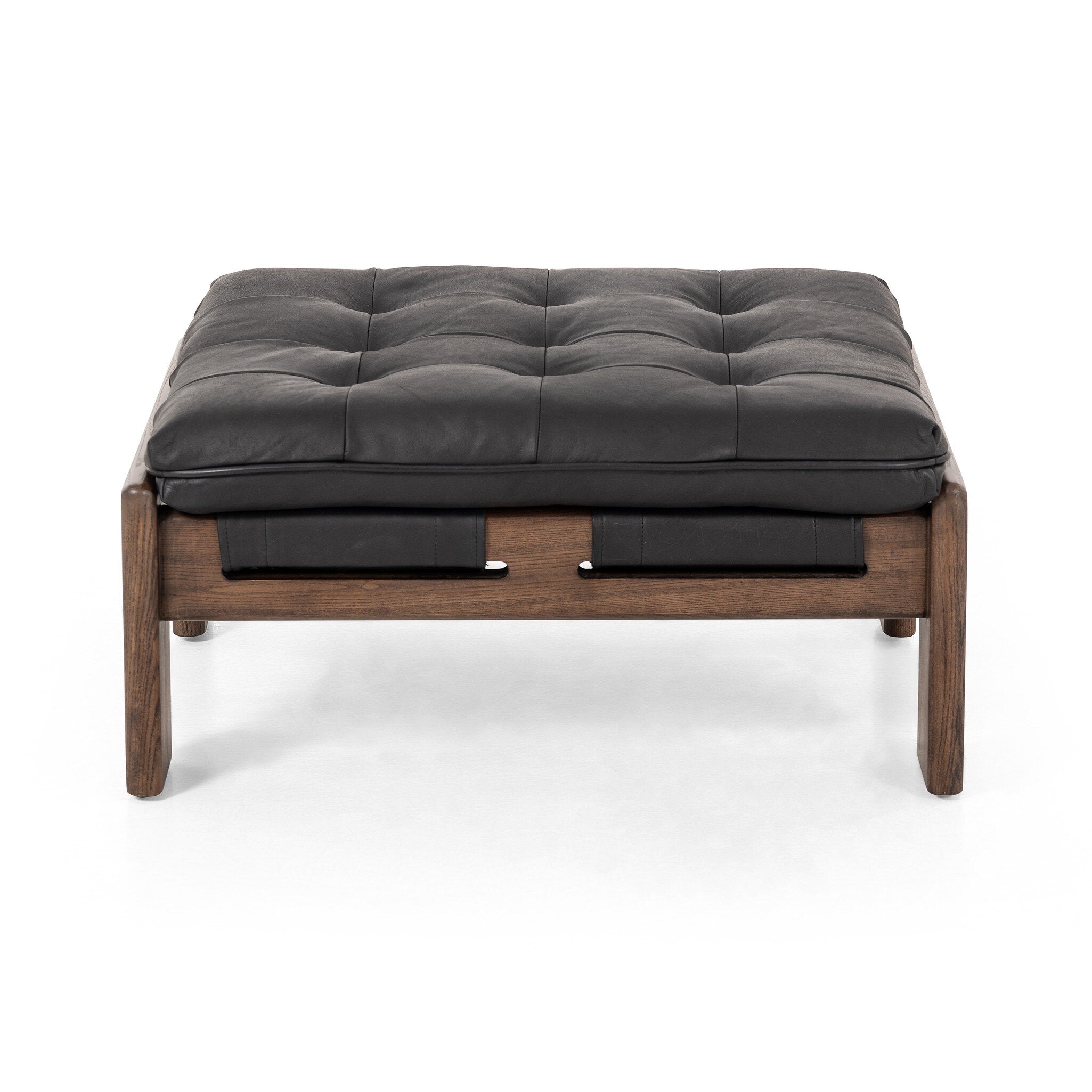 Black leather cushioned ottoman with wooden frame on a white background.