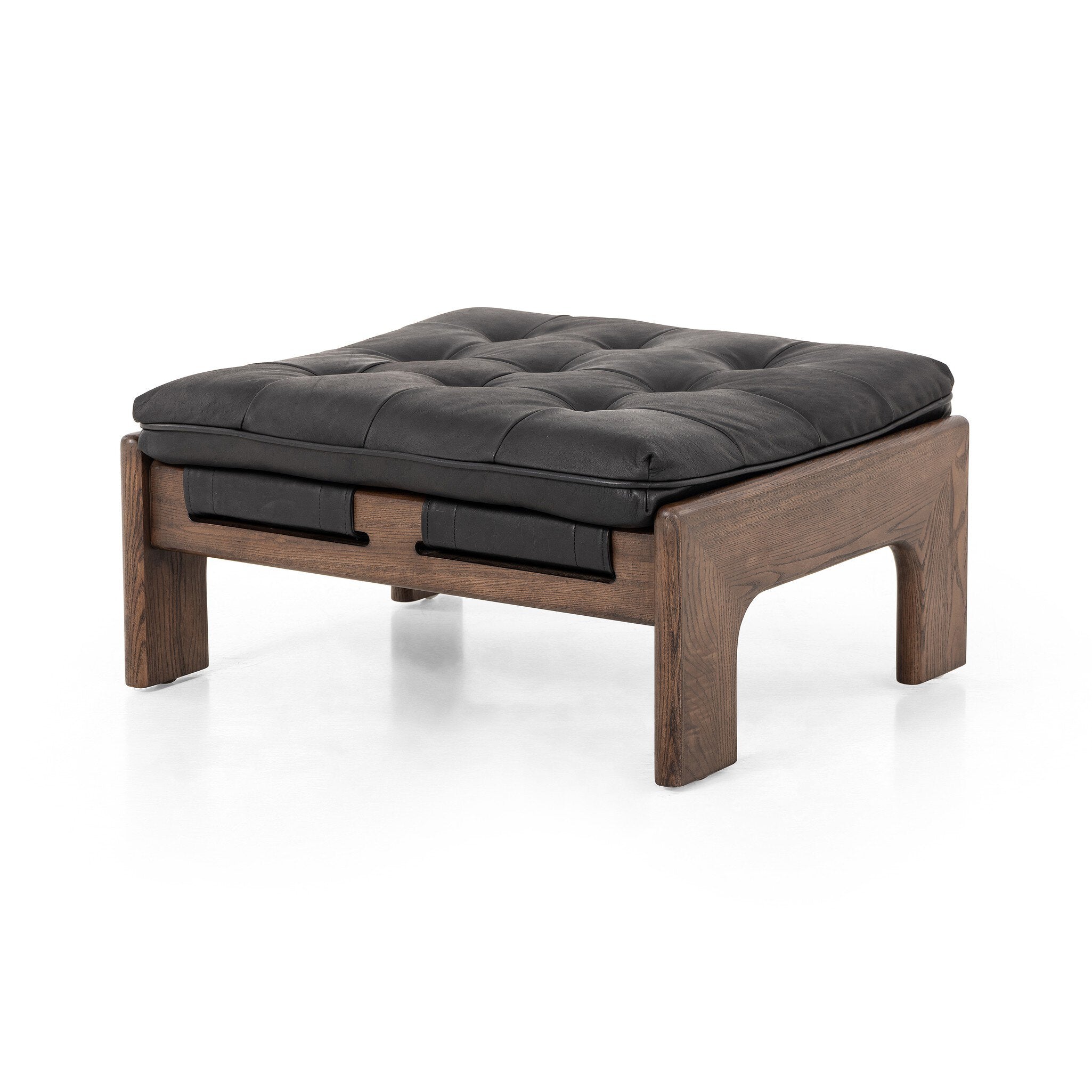 Black leather cushioned ottoman with wooden frame on a white background.