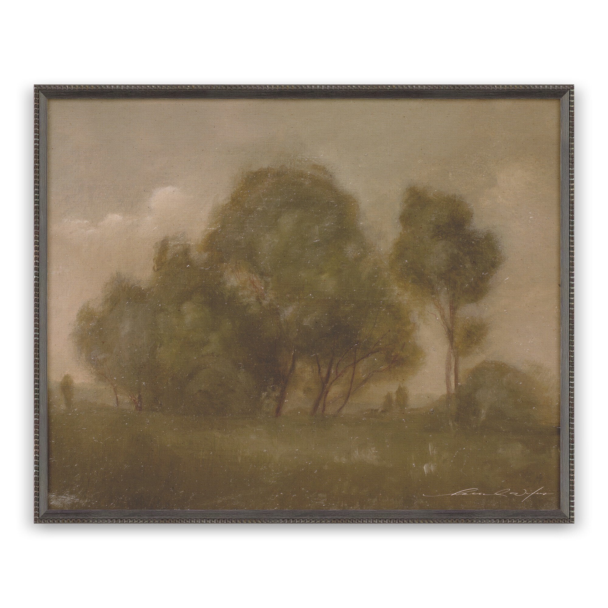 Framed artwork of a landscape with trees and a cloudy sky.
