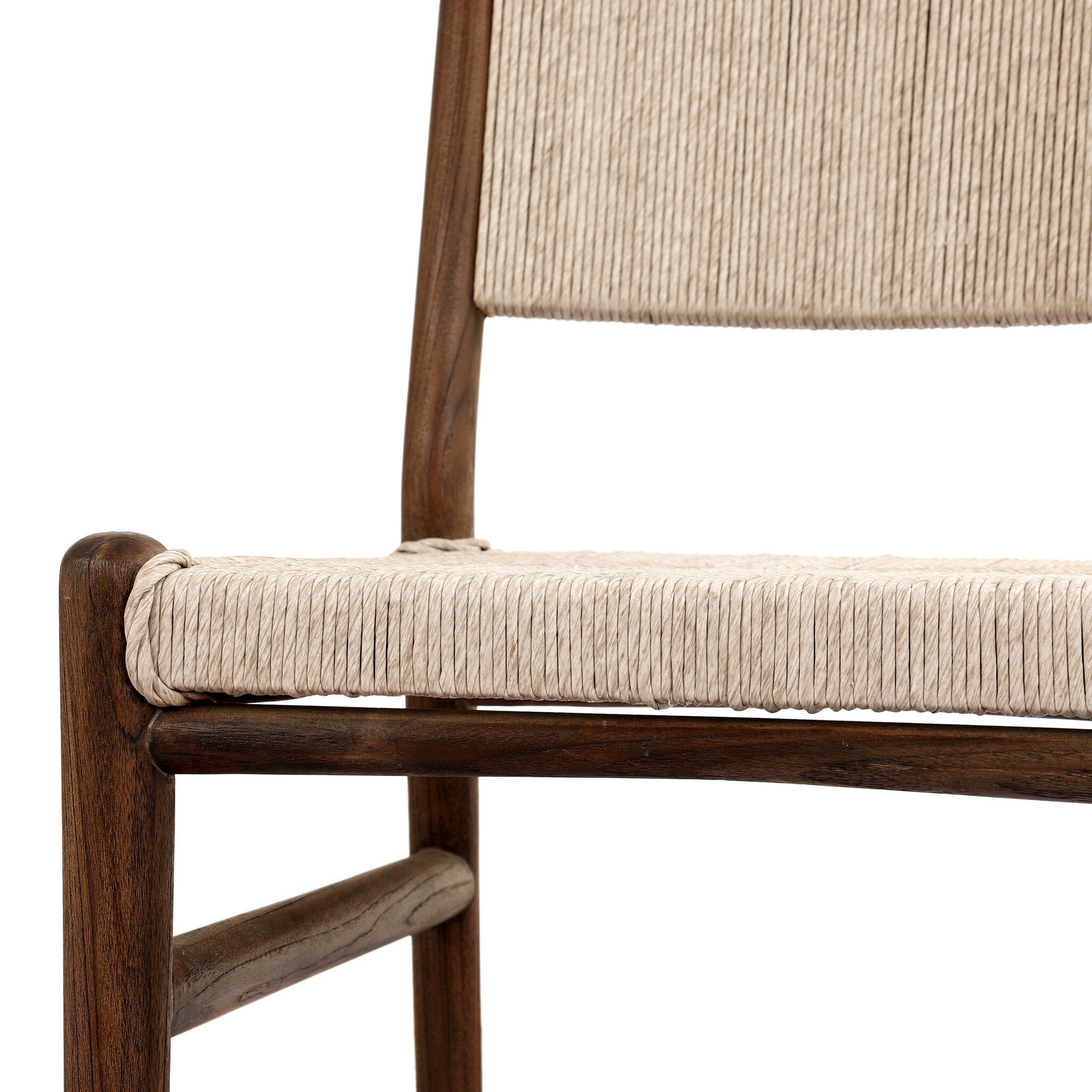 A close up view of a shaker style outdoor dining chair with a dark brown wood frame and light brown woven seat and back on a white background.