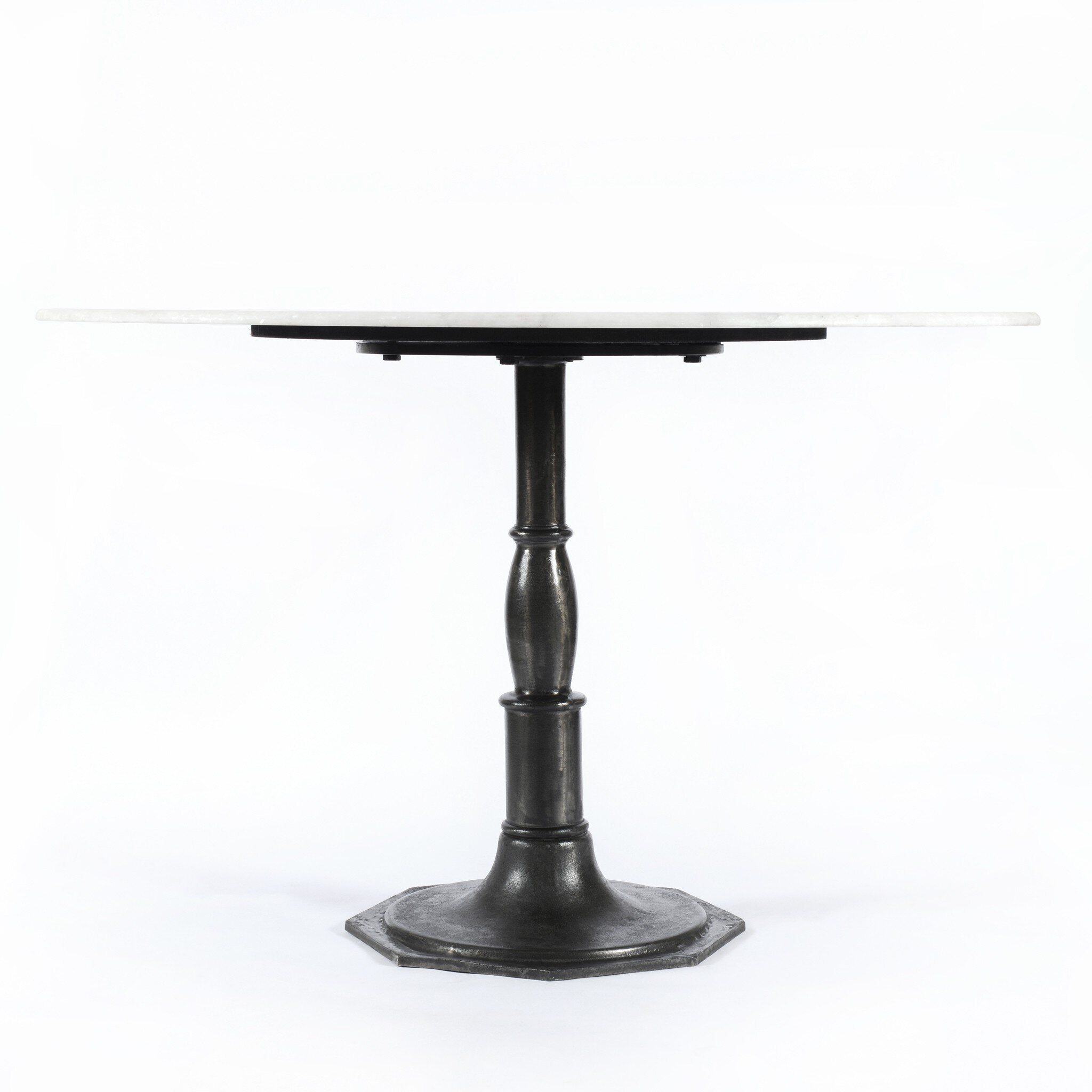 Round marble table with a black metal pedestal base on a white background.