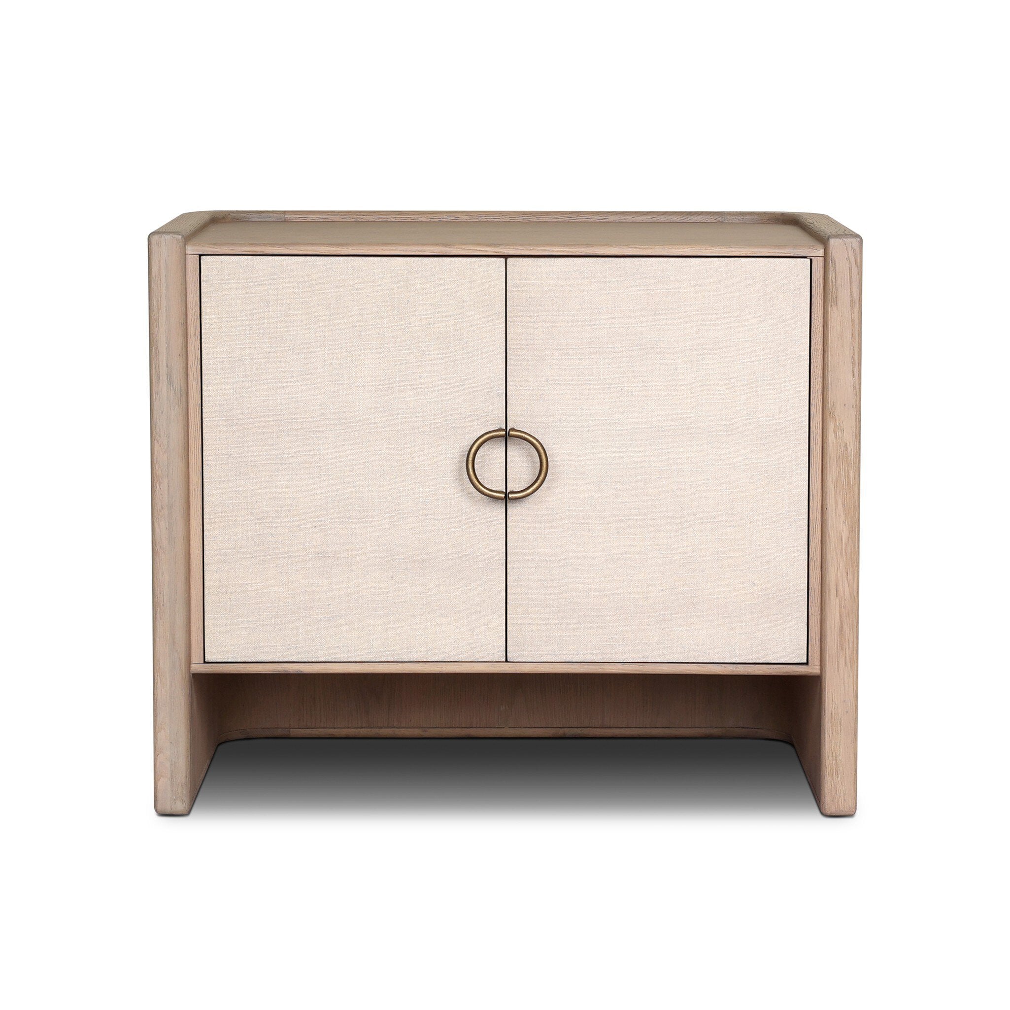 Small cabinet style nightstand with two doors and split circle hardware on a white background.