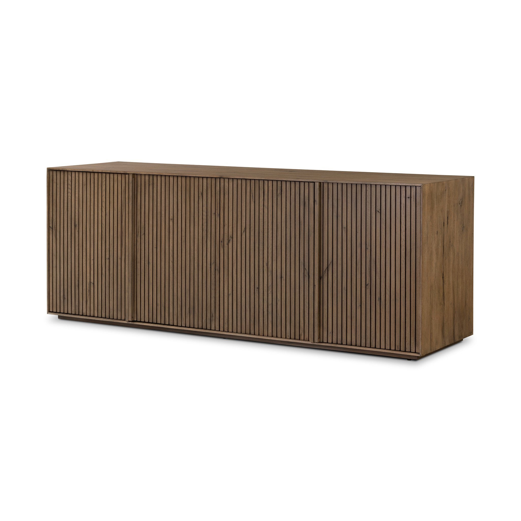 Wooden sideboard with vertical reeding on a white background.