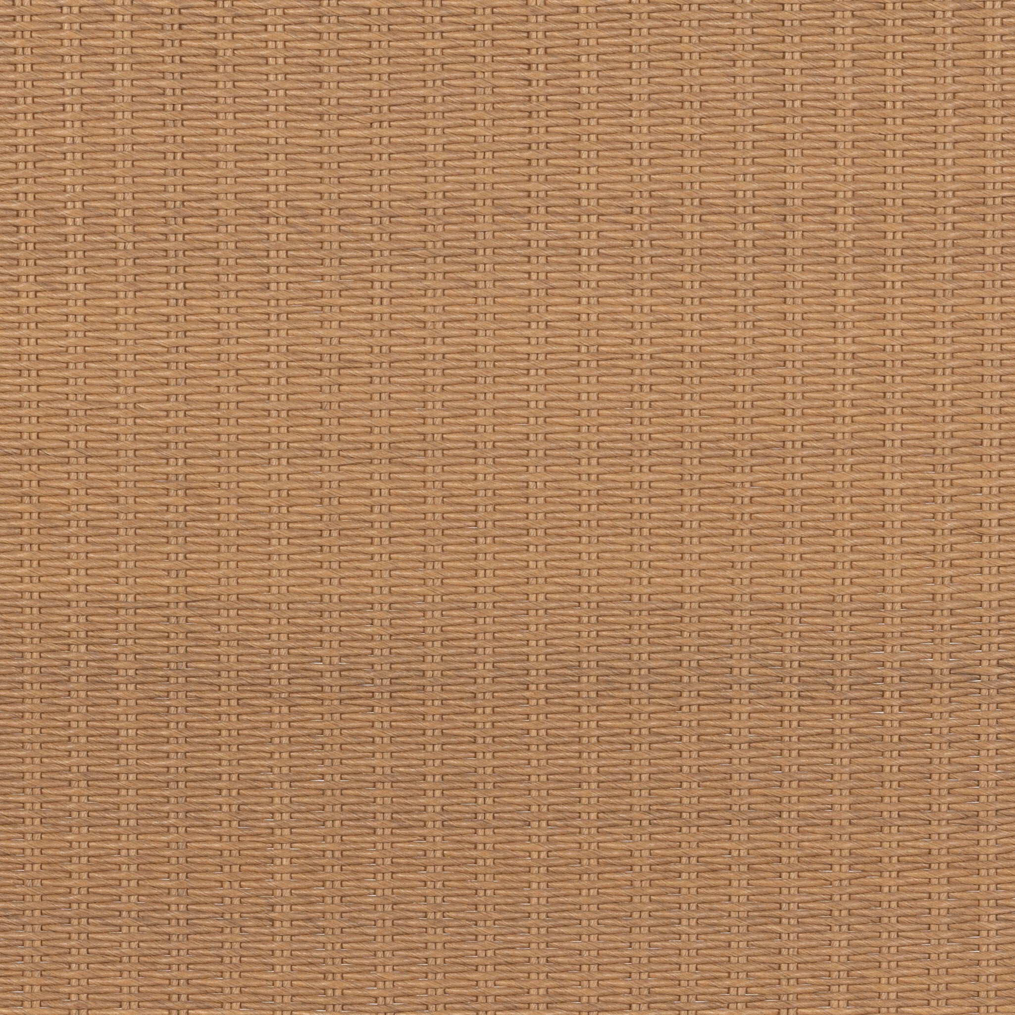 Close up of a wicker bed with white bedding on a white background.