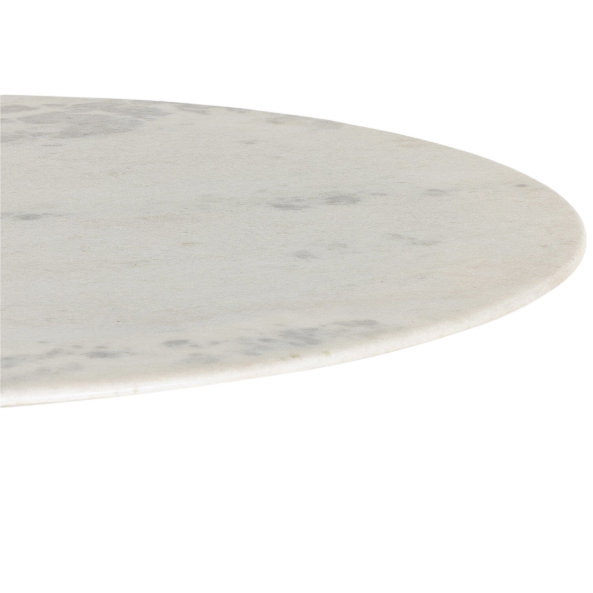 Close up of a round marble dining table with a black metal pedestal base on a white background.