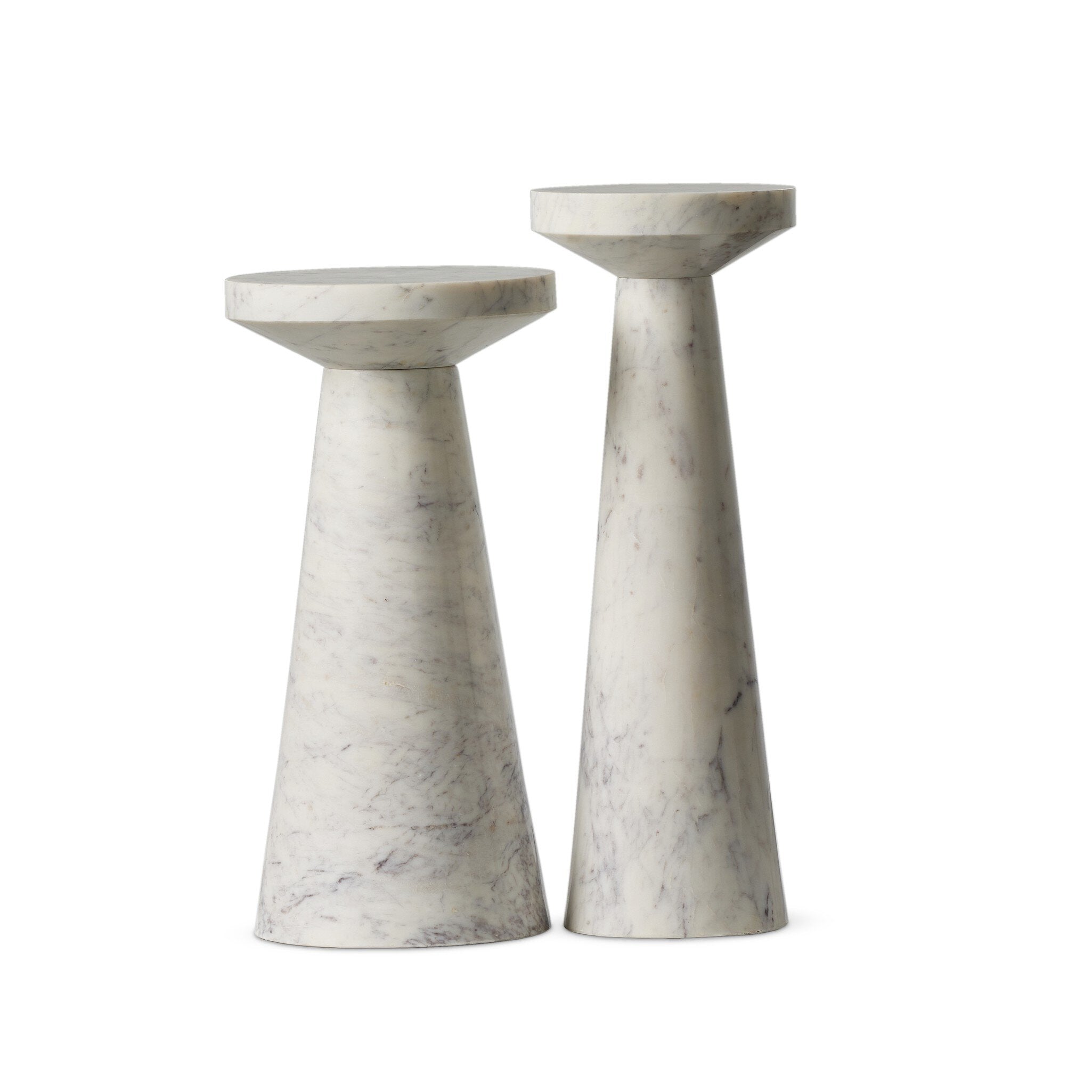 Two white marble nesting end tables with staggered heights on a white background.