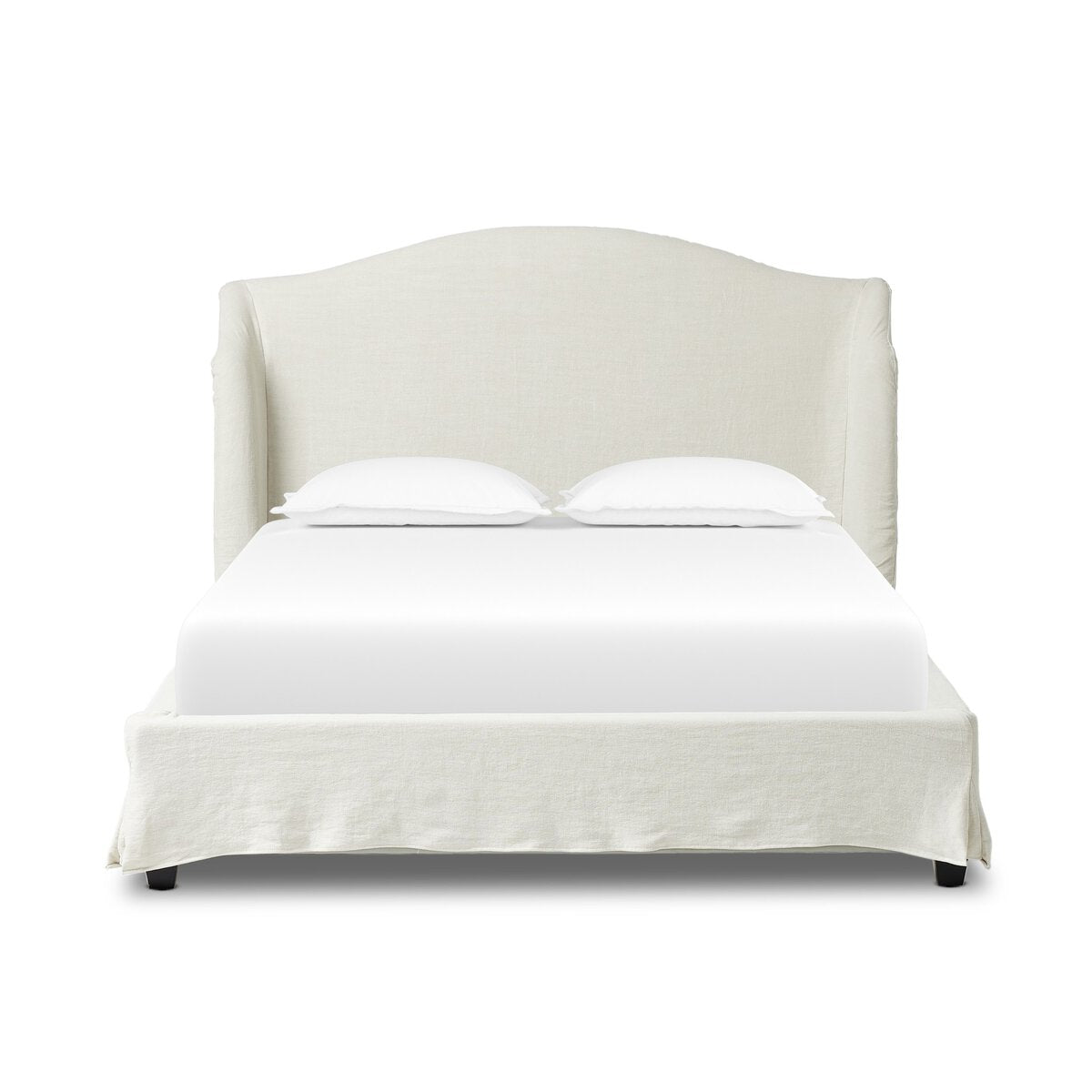 White bed with a matching headboard on a white background.