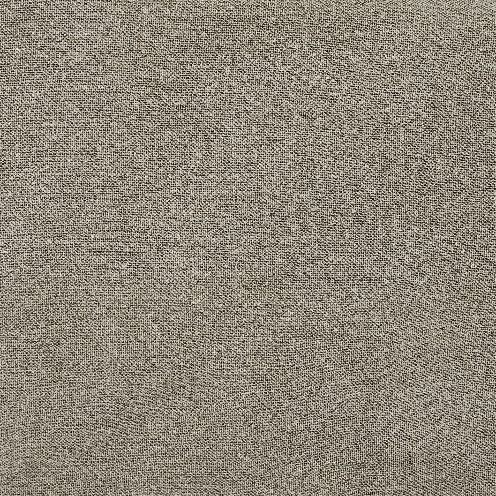 Close up of a beige upholstered bed with white bedding on a white background.