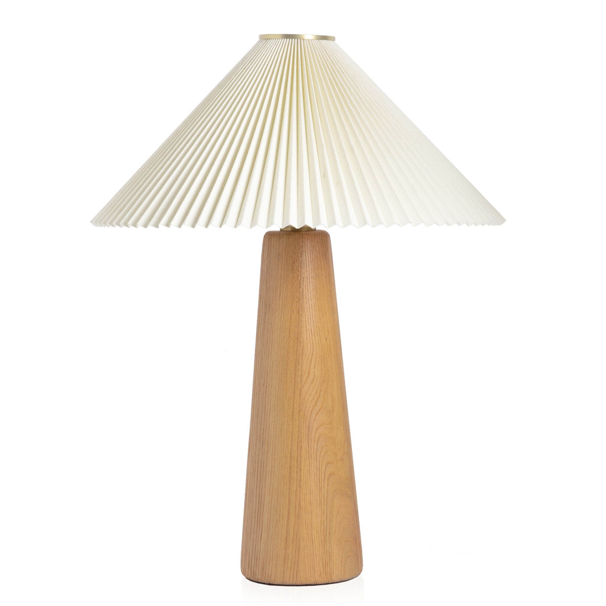 Table lamp with pleated white shade and wooden base on a white background.
