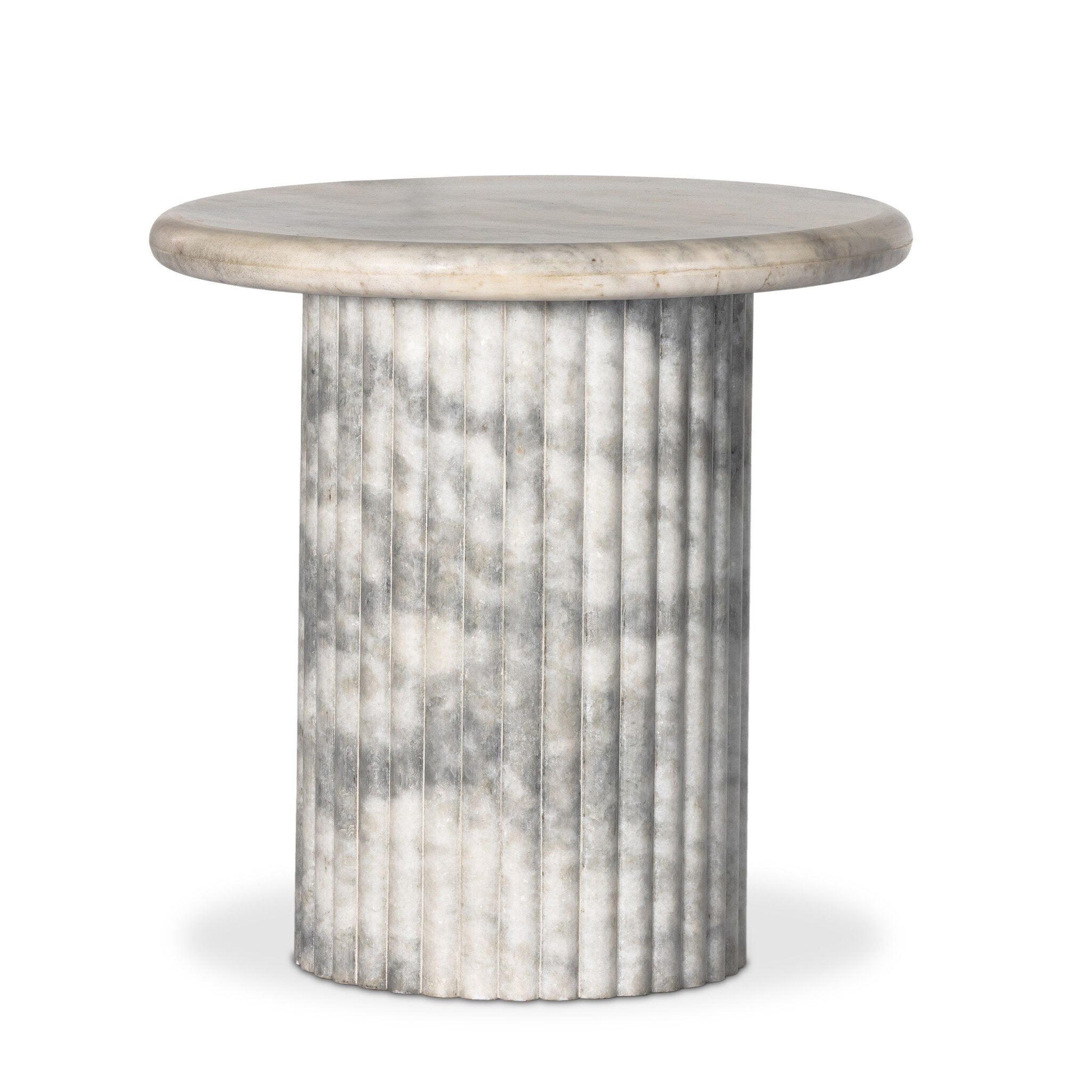 A ribbed marble base topped with polished white marble.