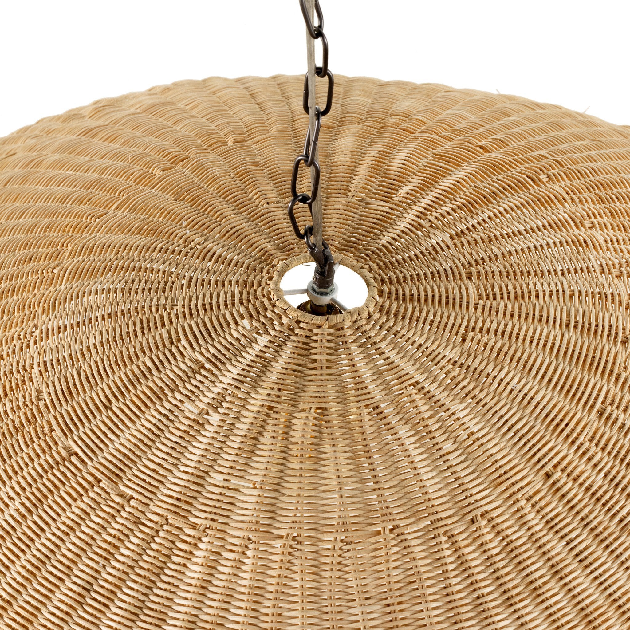Overhead view of a wicker pendant light with a chain on a white background