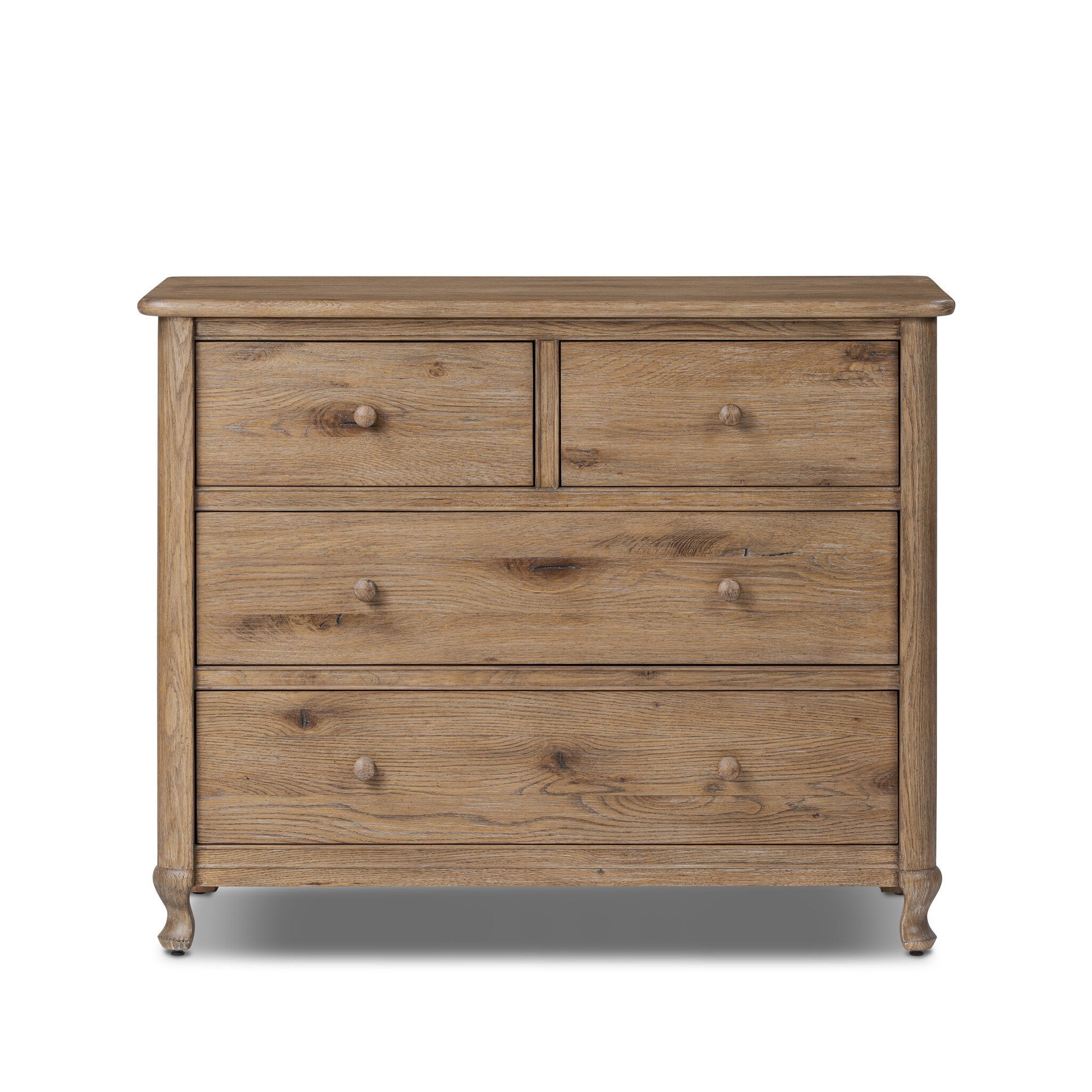 Wooden dresser with four drawers on a white background.