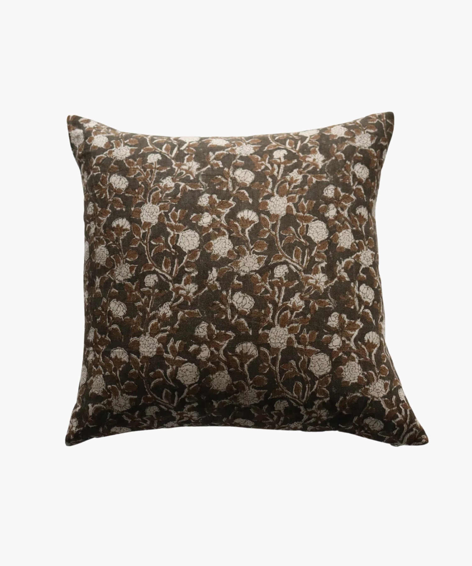 A square pillow with a floral pattern of brown leaves and white flowers on a dark background. The design is intricate and evokes a cozy feel.