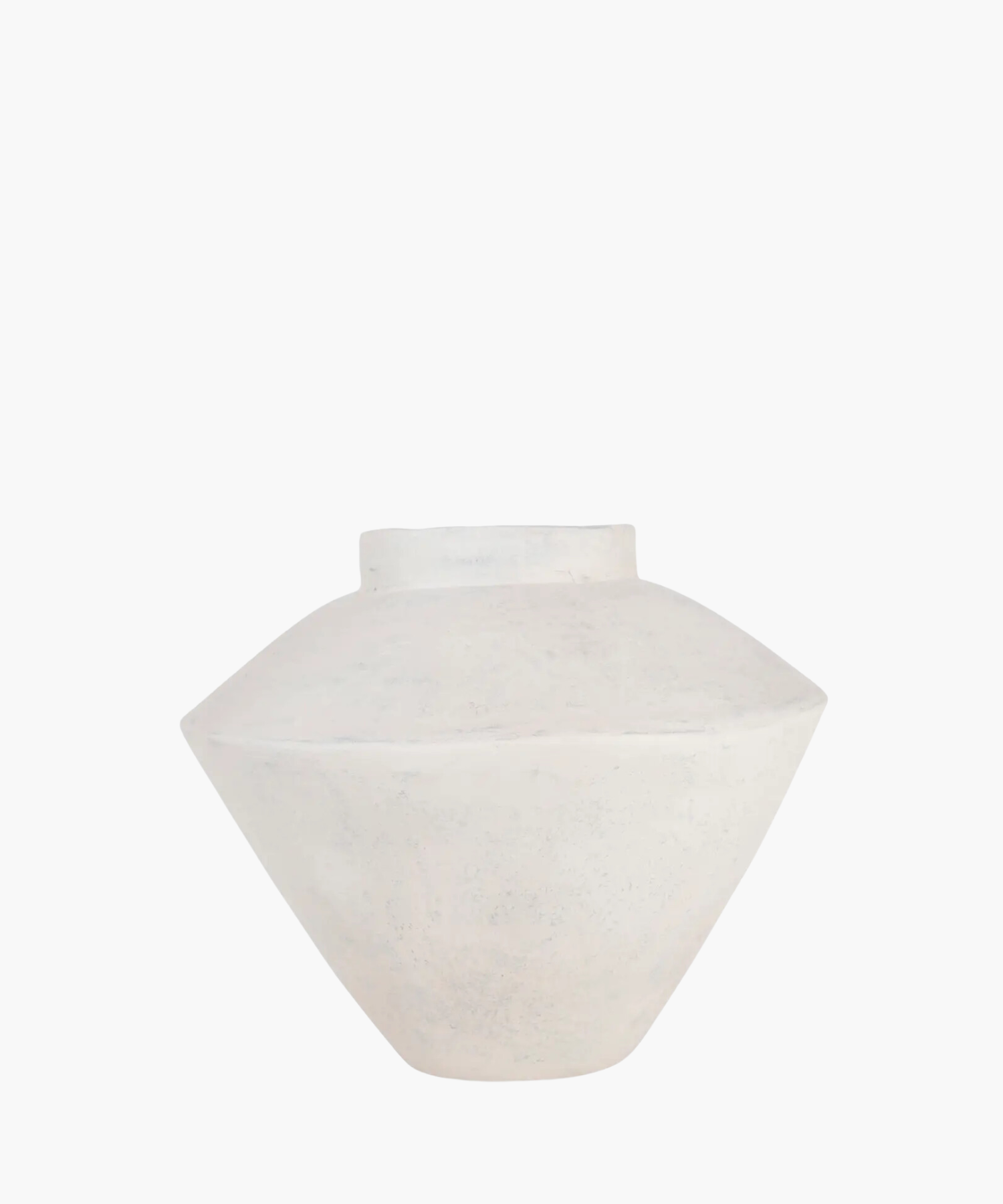 A minimalist, matte white ceramic vase with a wide, flat body and small opening, set against a plain background, conveying simplicity and elegance.
