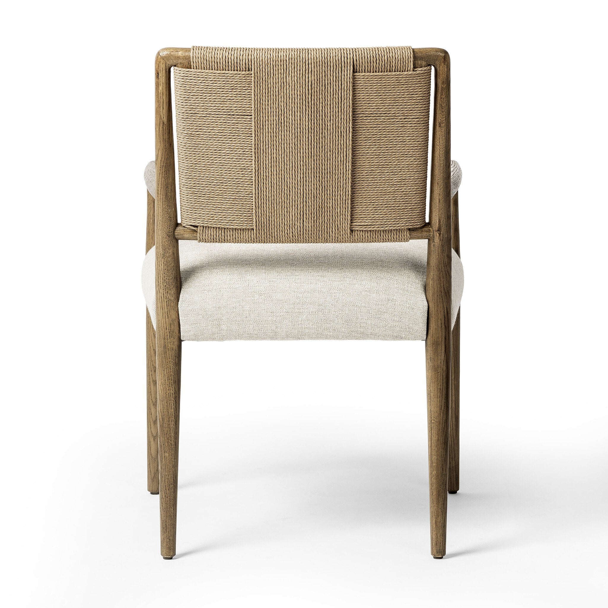 Dining chair with woven backrest and upholstered seat on a white background.