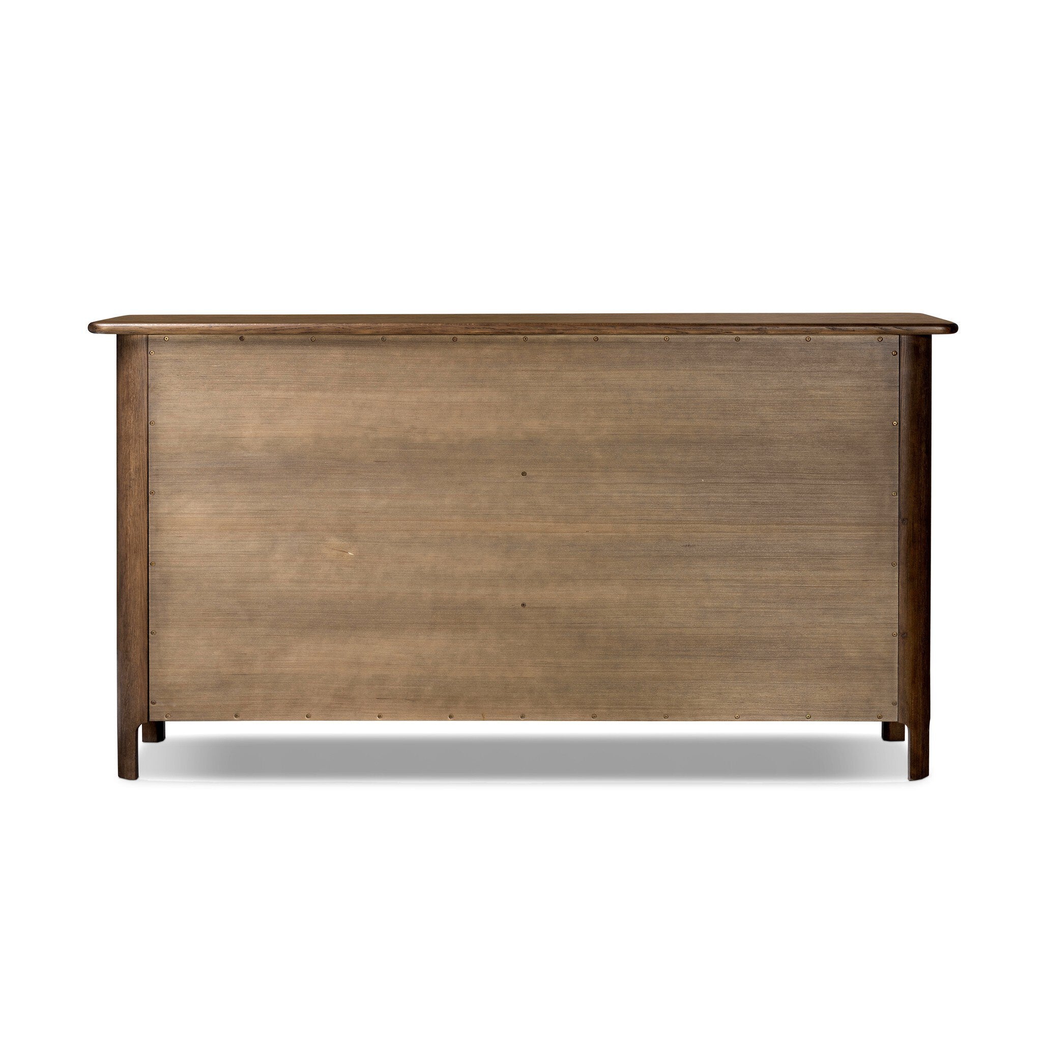 The back of a wooden dresser with multiple drawers on a white background.