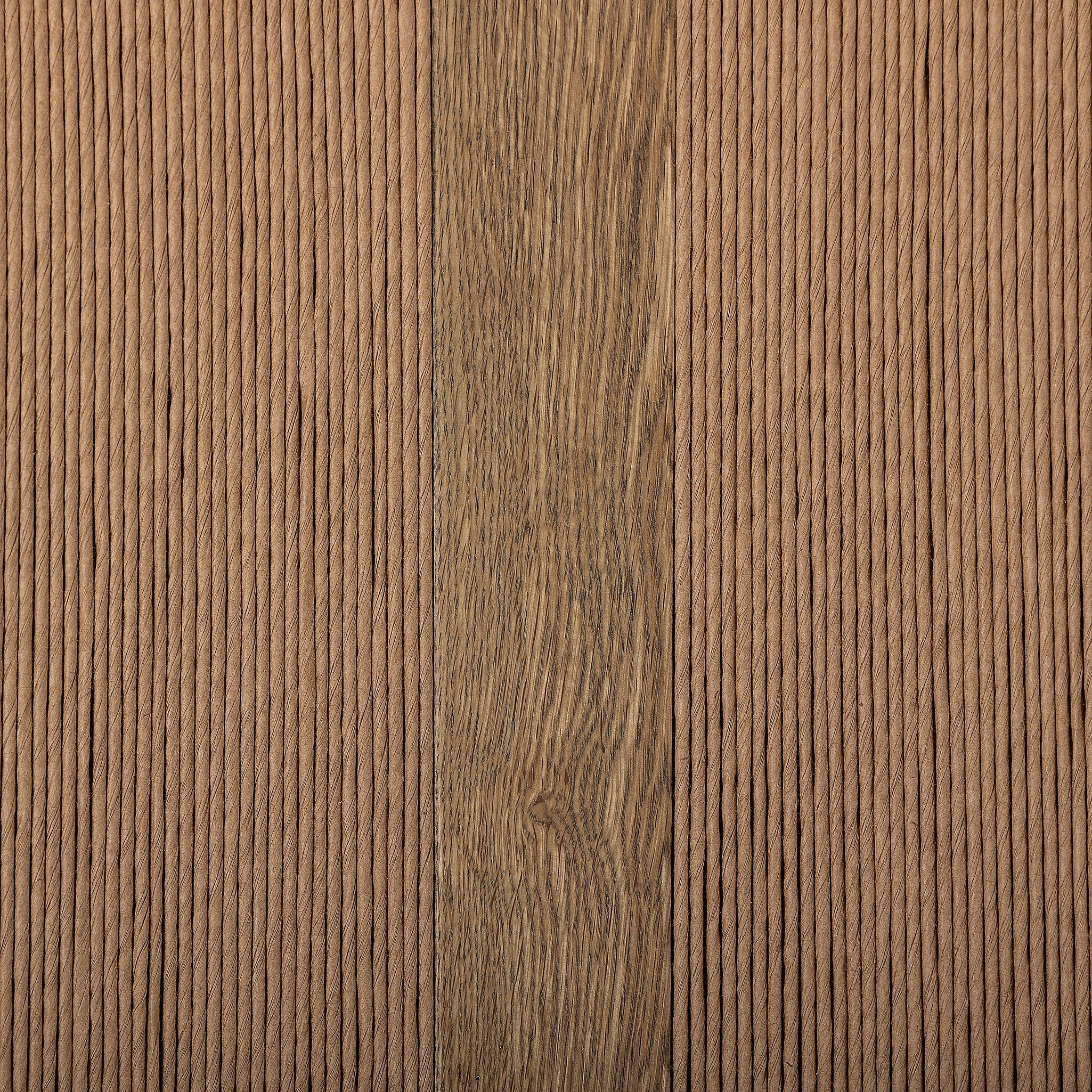 Close up of a wooden dining chair with a woven backrest and white cushion on a white background.