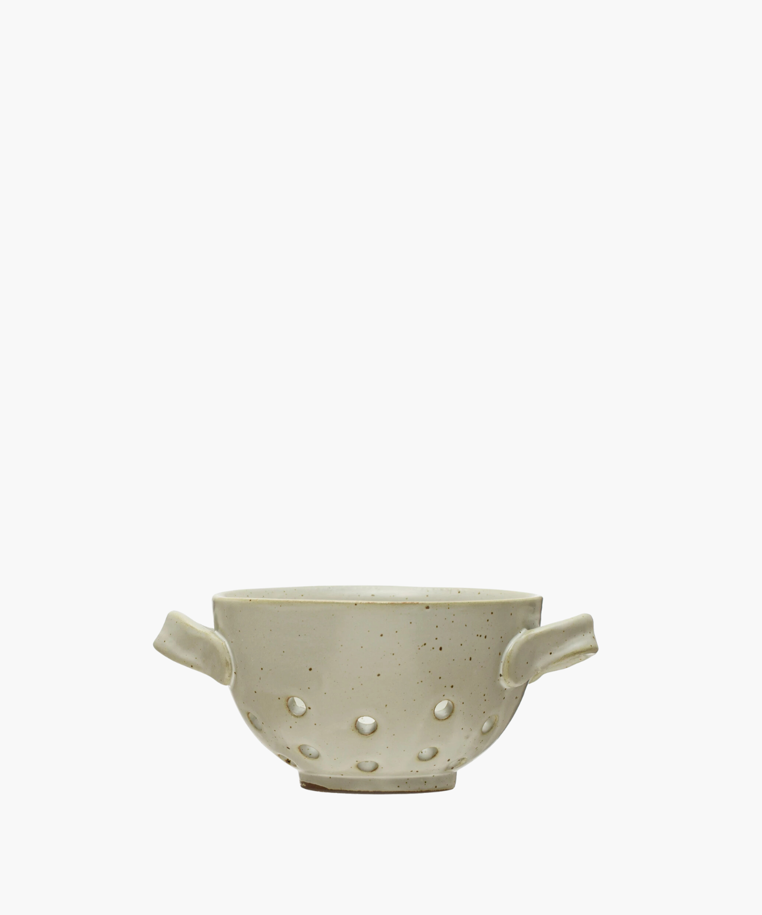 A small white ceramic berry bowl with handles and a reactive glaze on a plain background.