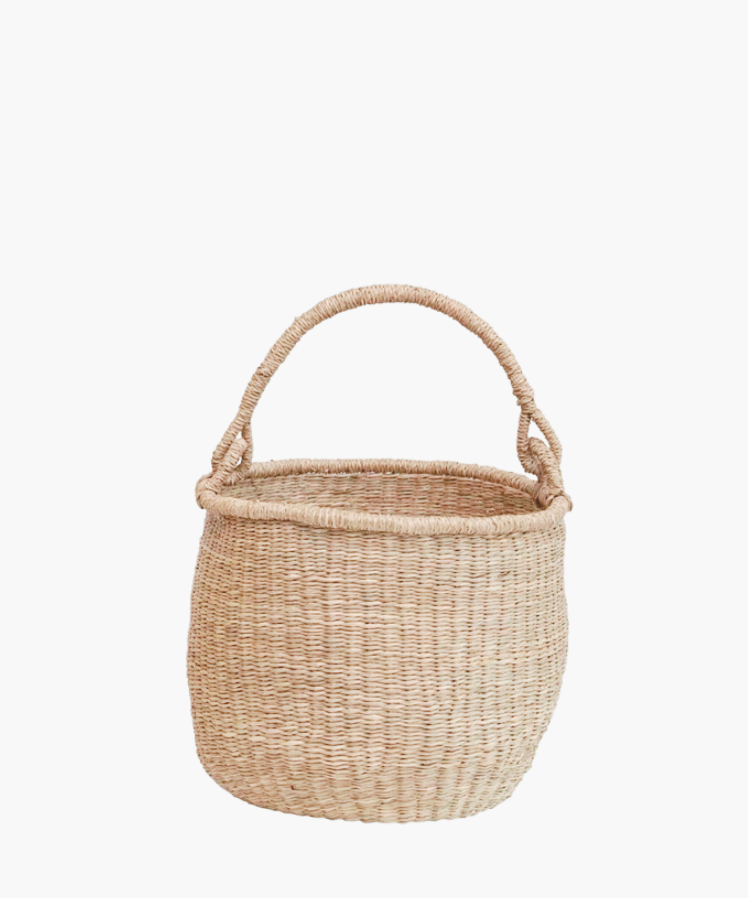 Small hand-woven seagrass basket with sturdy handle, showcasing natural beige tone.