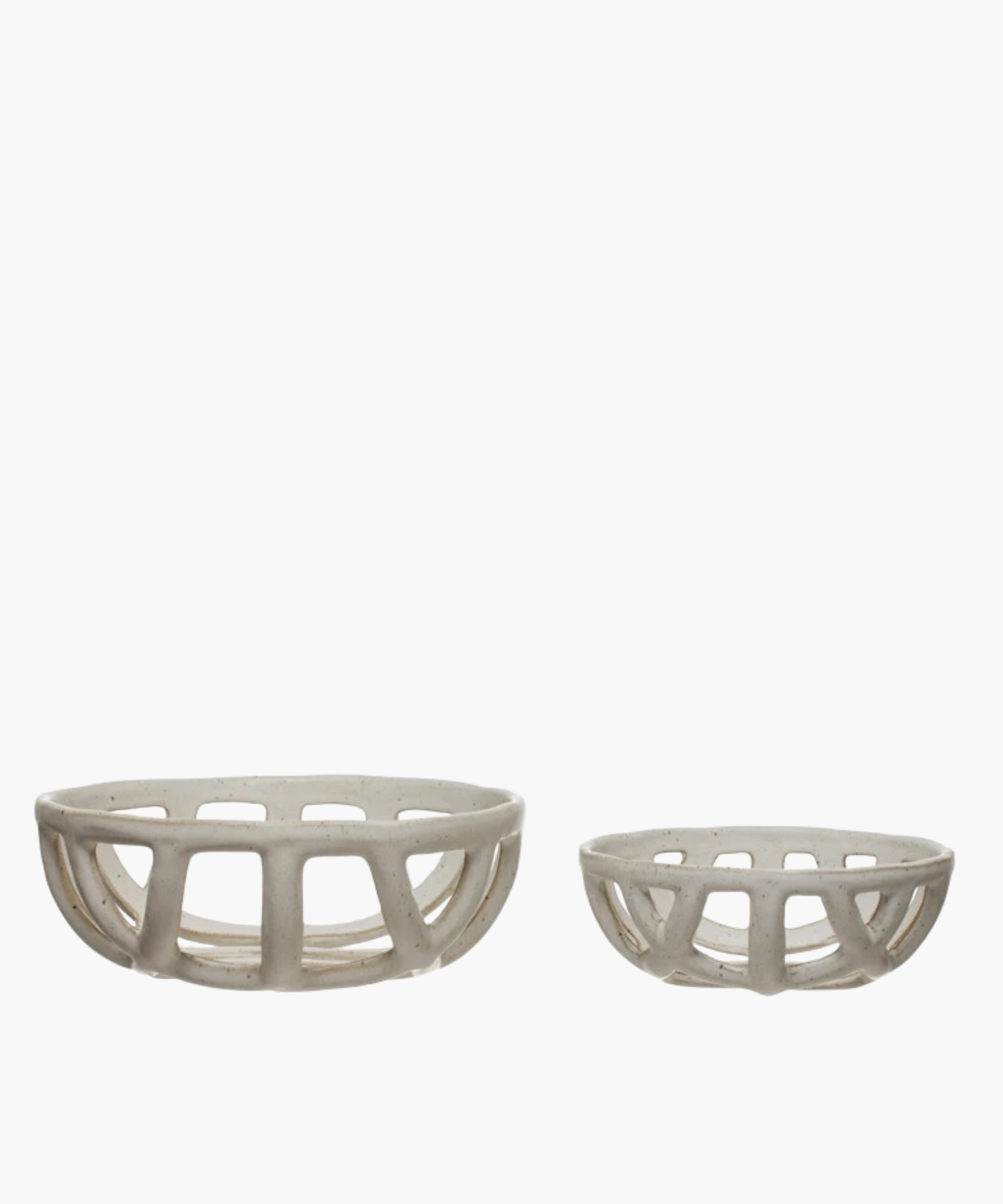 Two openwork stoneware ceramic bowls with a white reactive glaze finish, one larger than the other, featuring an airy, lattice-like design. The tone is minimalist and modern.