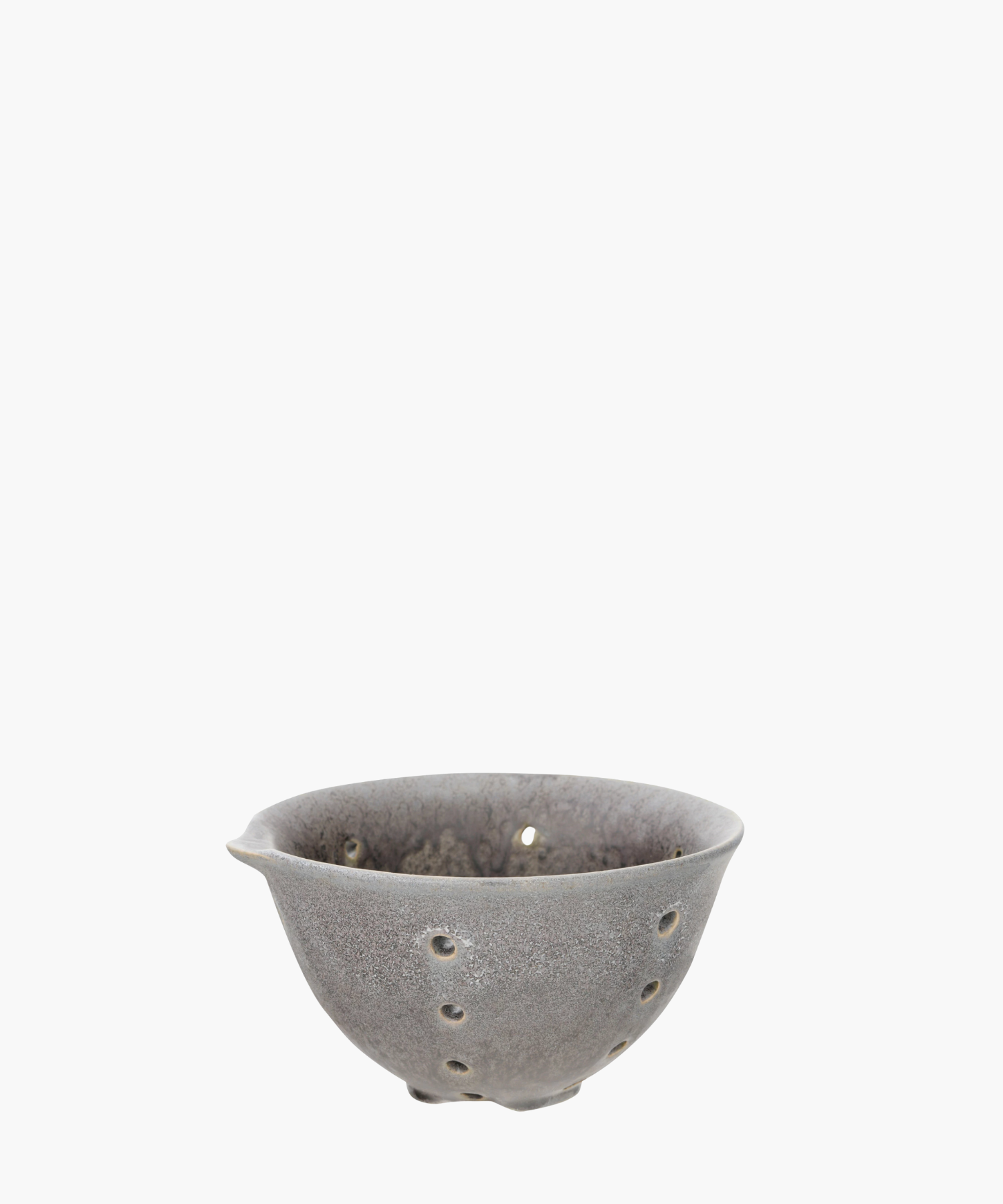 A ceramic bowl with small holes. The bowl is a textured gray. Simple and artistic.