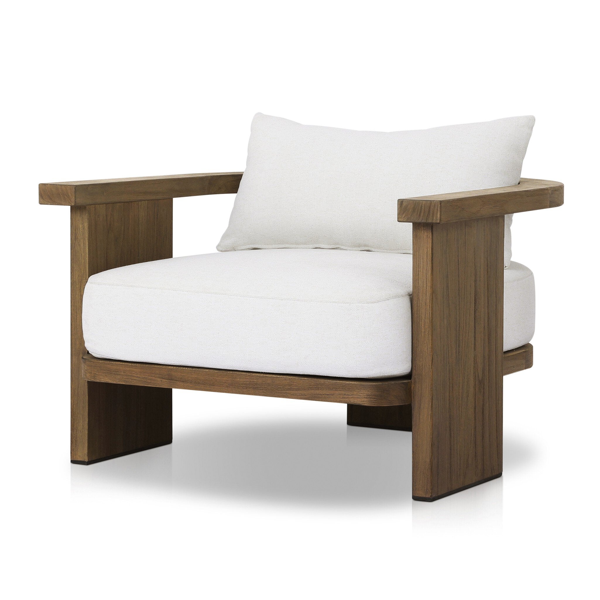 Outdoor armchair with a curved wooden frame out of teak and white linen cushions on a white background.