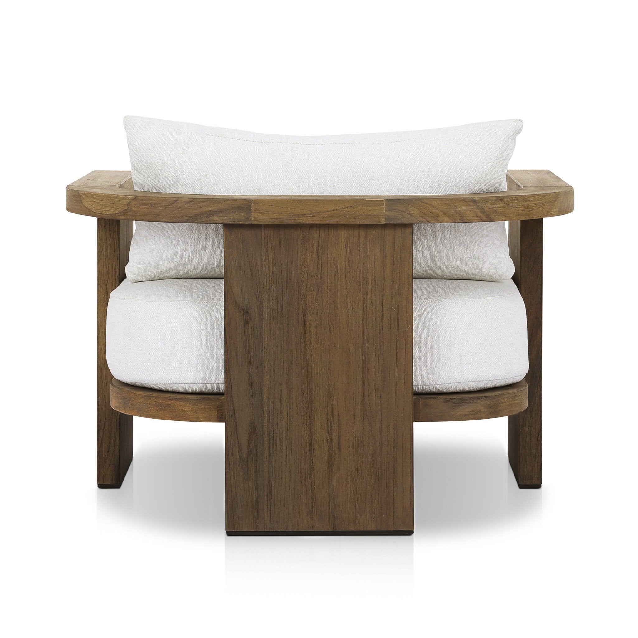The back of an outdoor armchair with a curved wooden frame out of teak and white linen cushions on a white background.