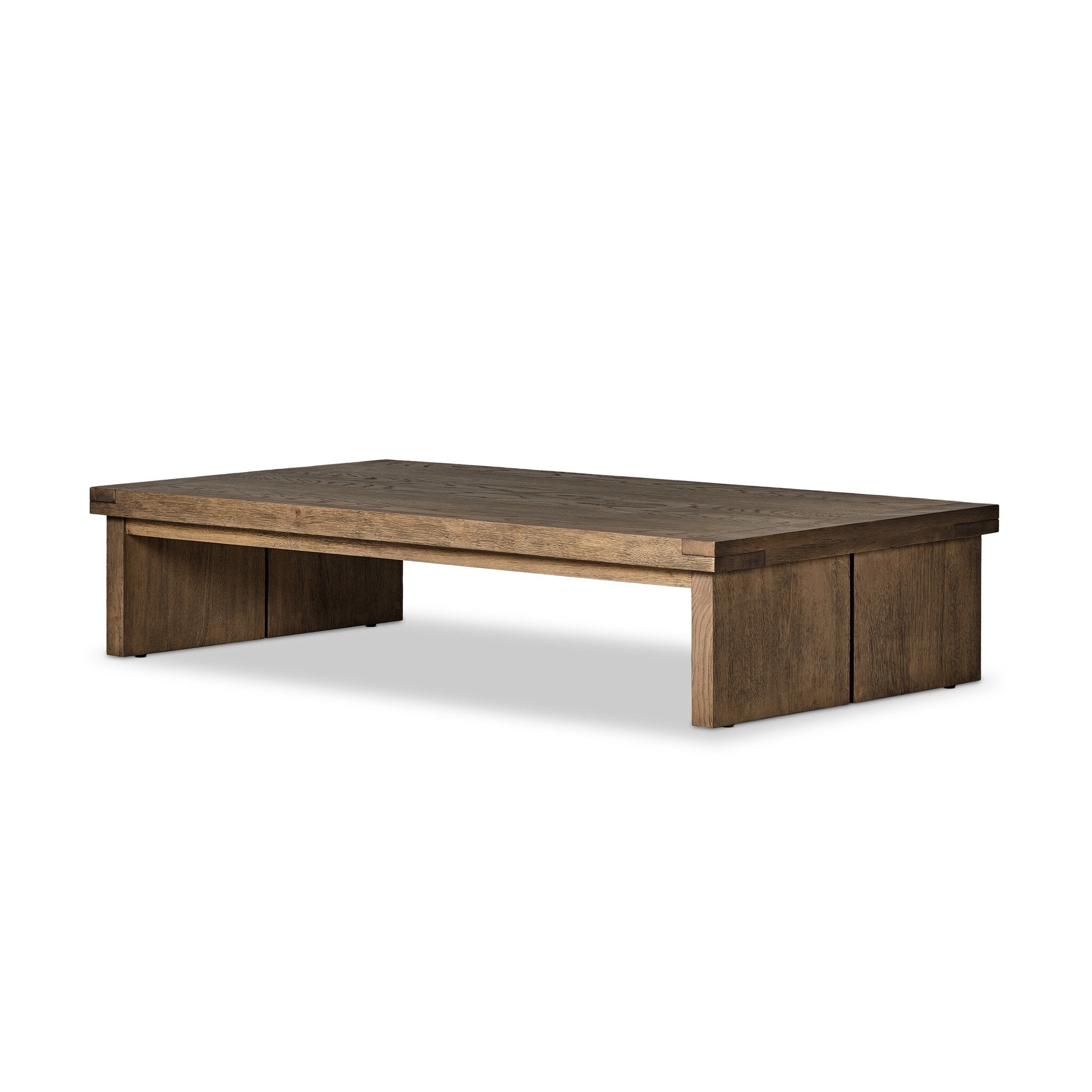 An oak coffee table on a white background.