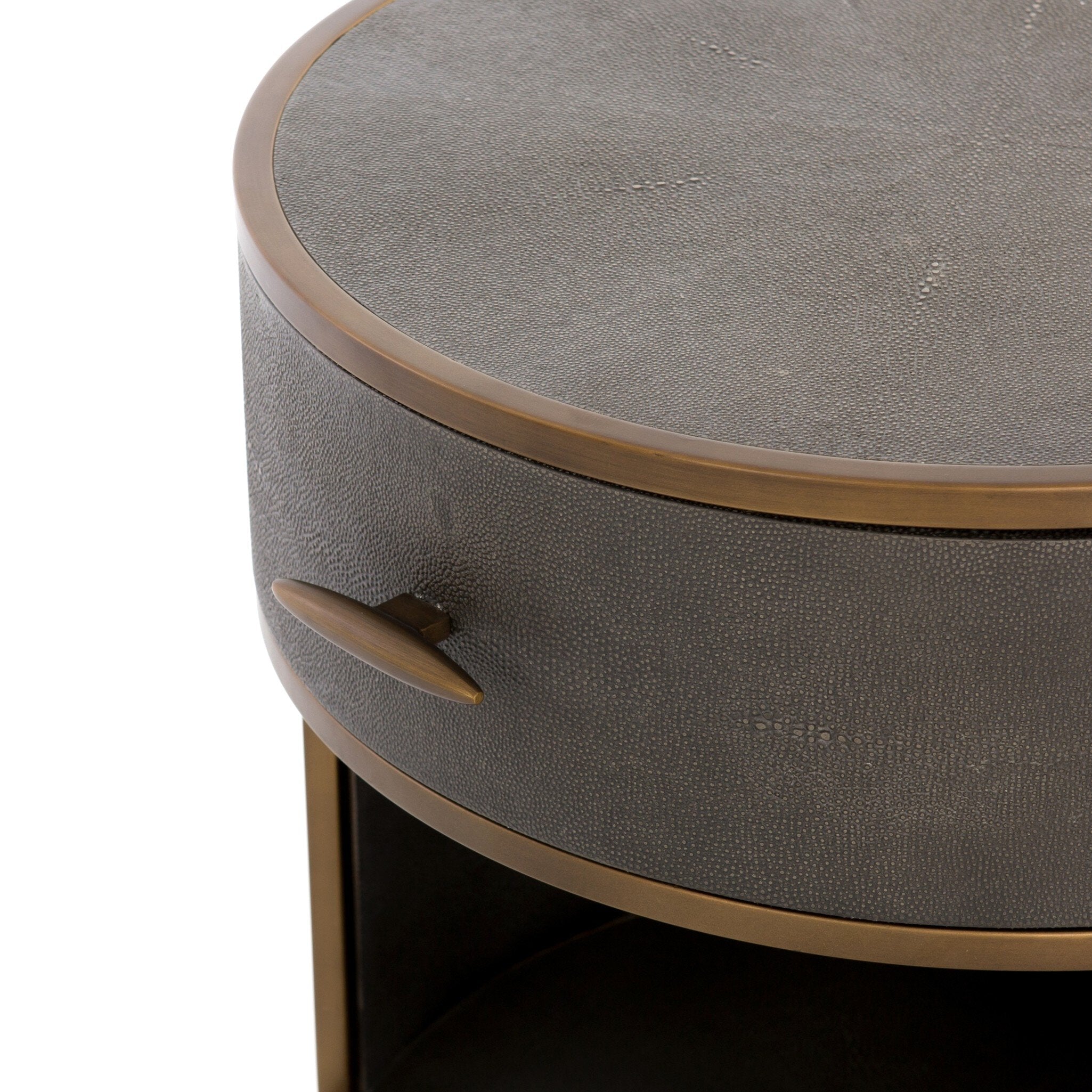 Round nightstand with a drawer and bronze legs on a white background.