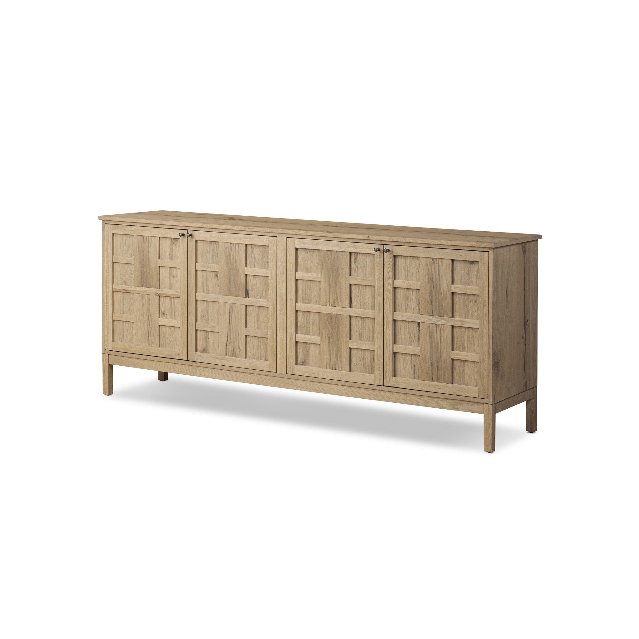 Wood sideboard with a grid like pattern on the doors on a white background.