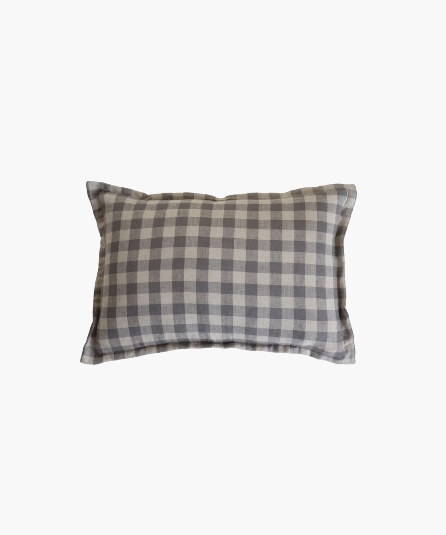 A rectangular or lumbar pillow cover features a blue gray gingham pattern on a natural fabric printed on both sides conveying a cozy and rustic feel.