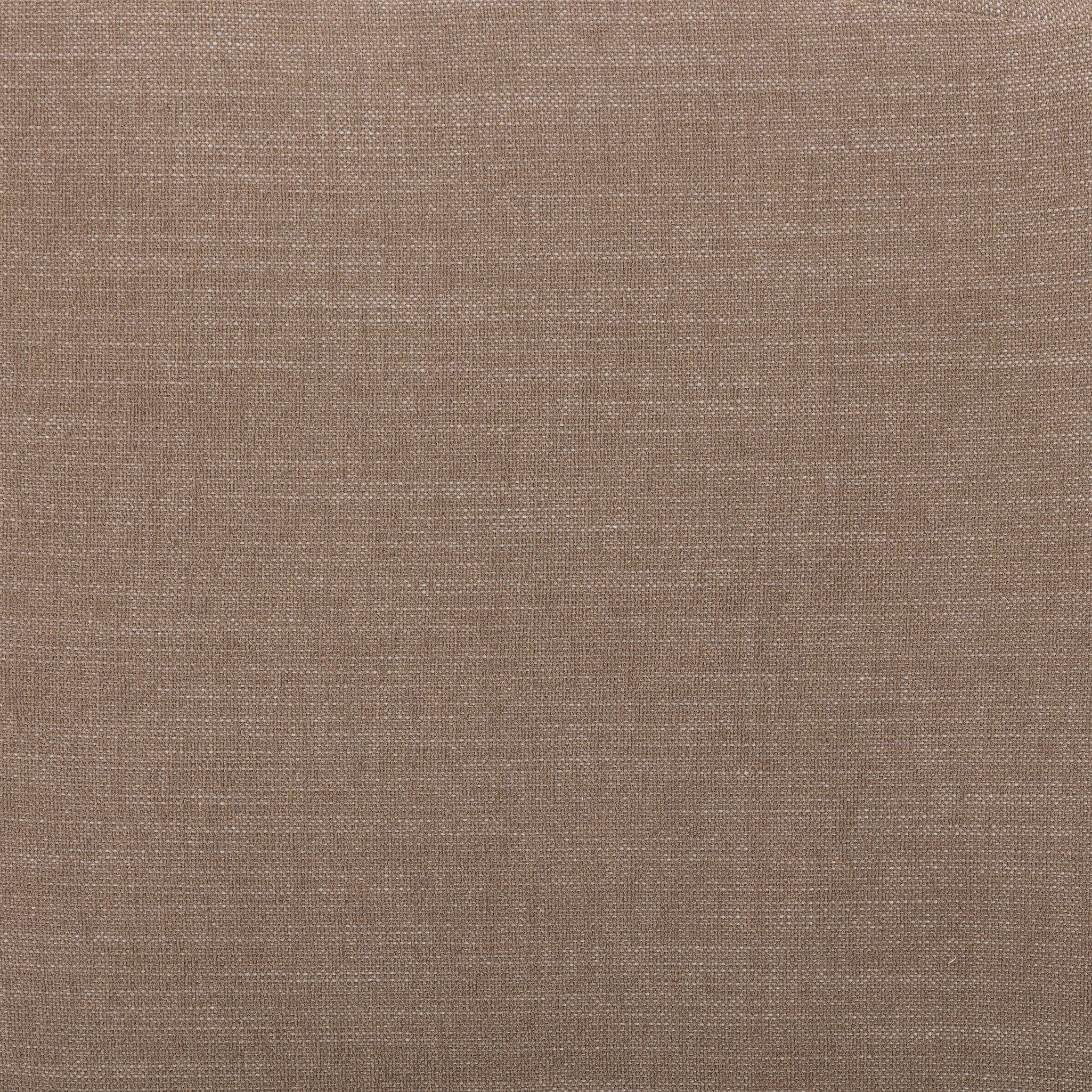 Close up of a taupe dining banquette with quilted texture on a white background.